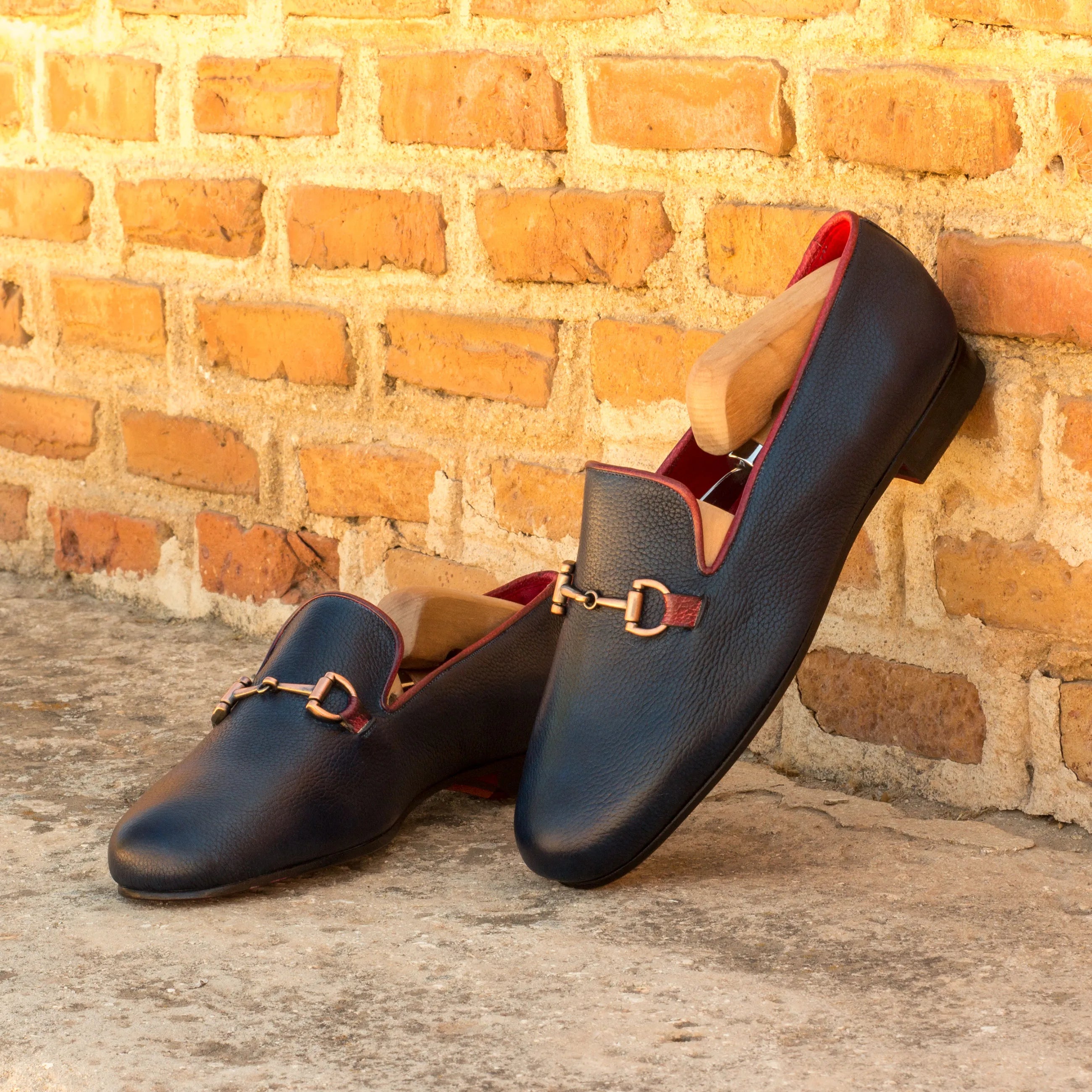 Leather loafers with gold hardware, featuring the Dios Wellington Slipon design