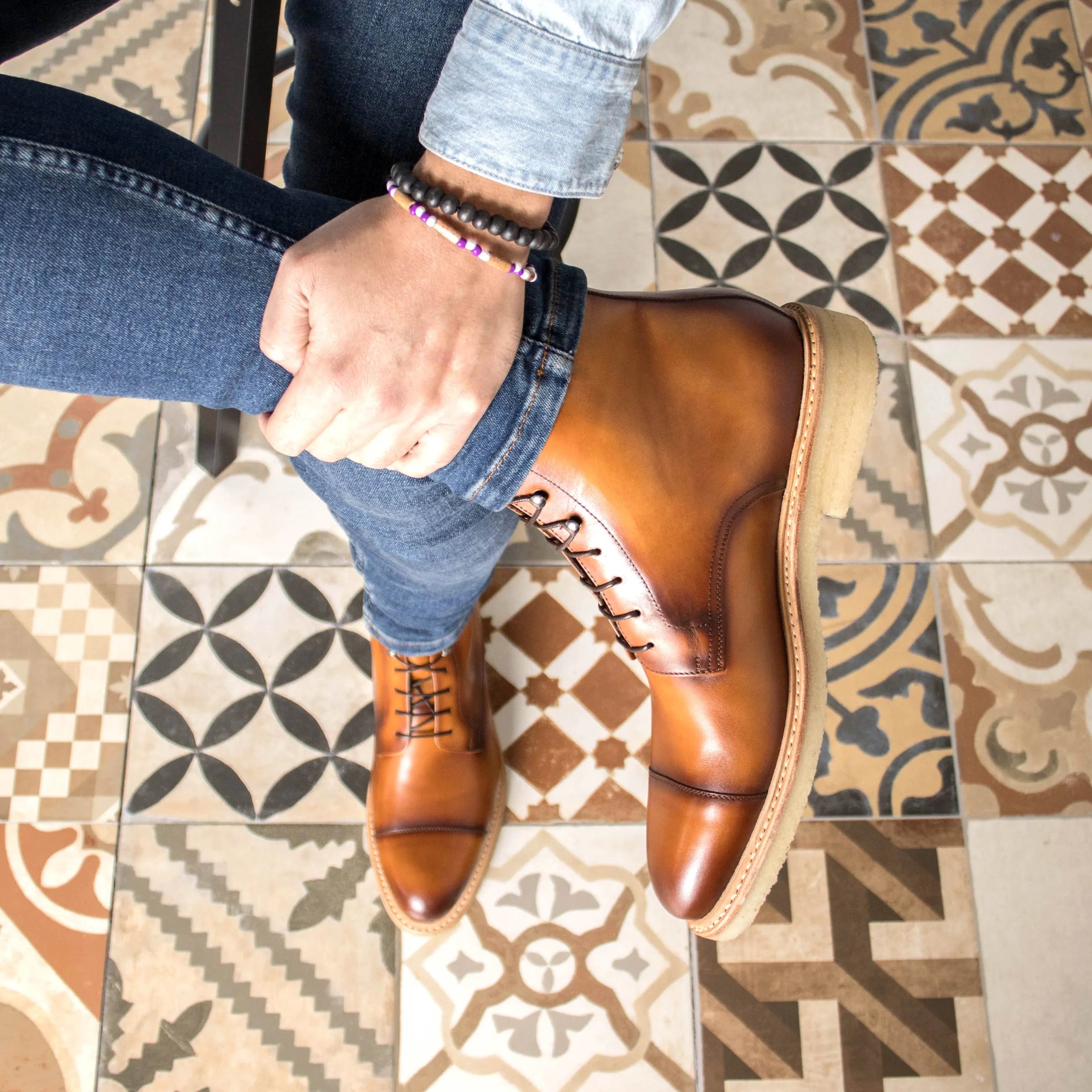 Brown leather cap-toe boots from the Disray Jumper collection for a stylish fast lane look