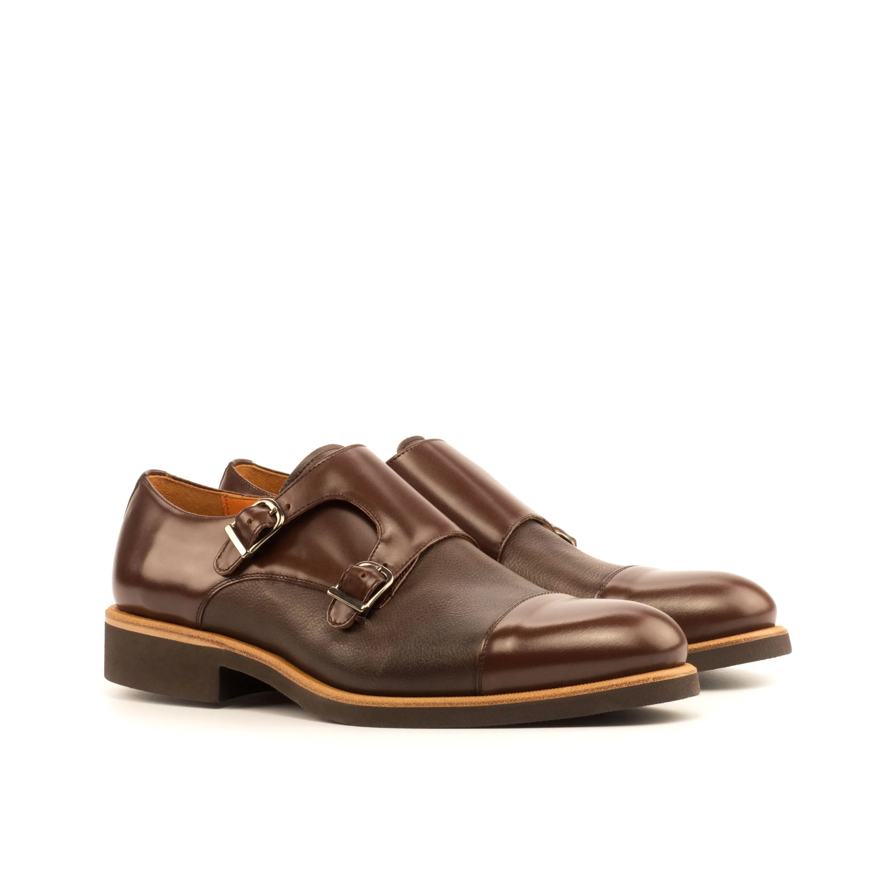 Brown leather DMC Double Monk shoes featuring a refined double monk patina design
