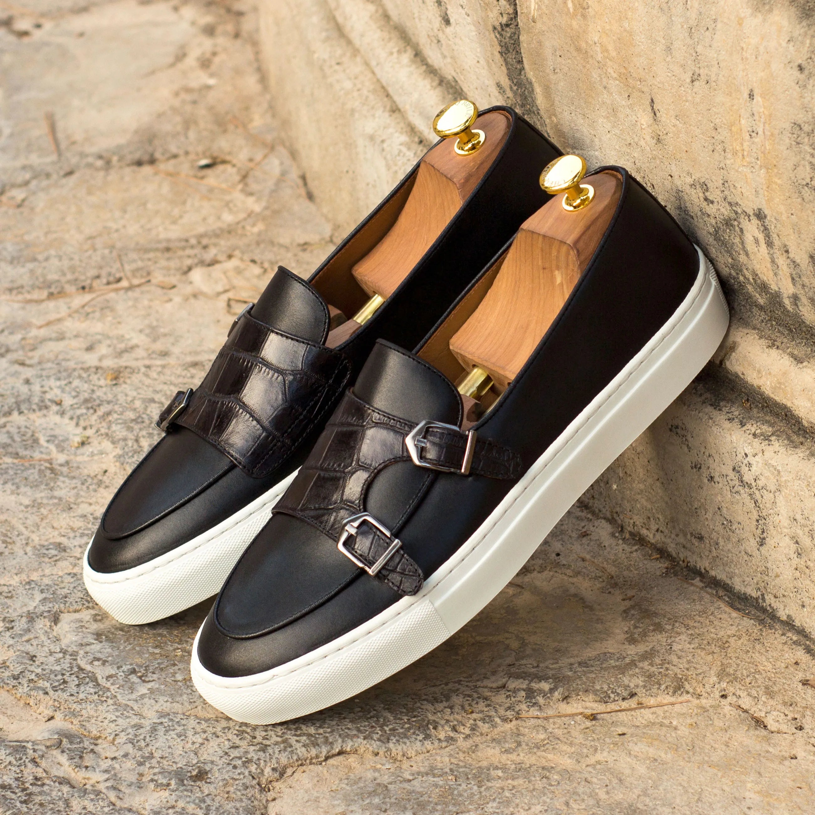 Black leather Don Monk sneaker featuring stylish monk strap design