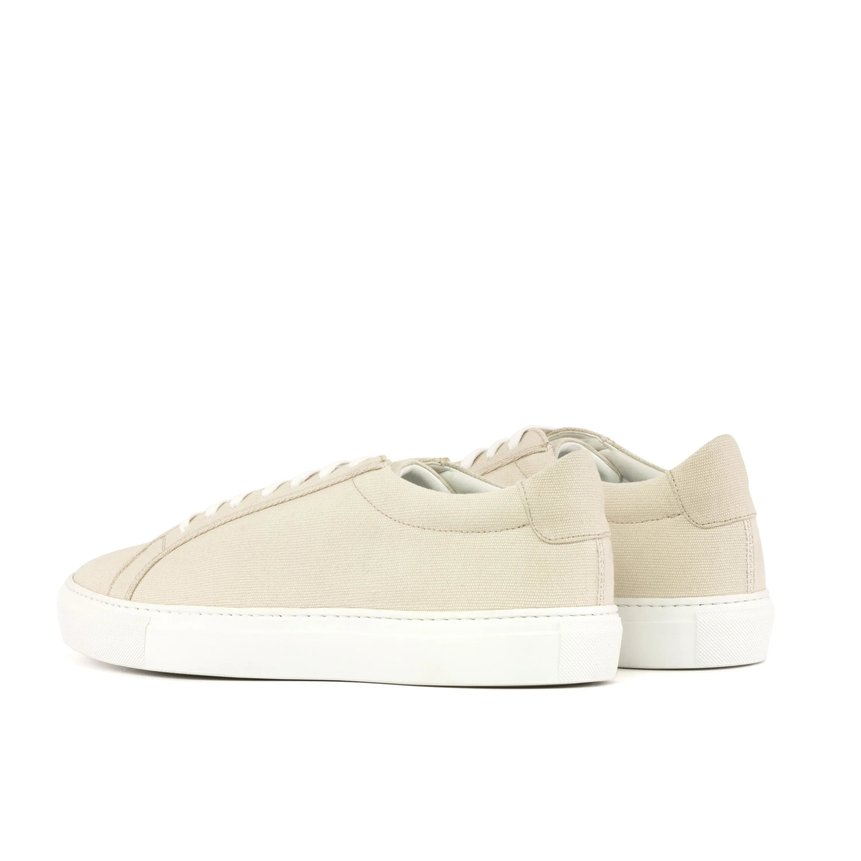 Beige leather sneakers from the Donni Low Kick Vegan Sneaker collection