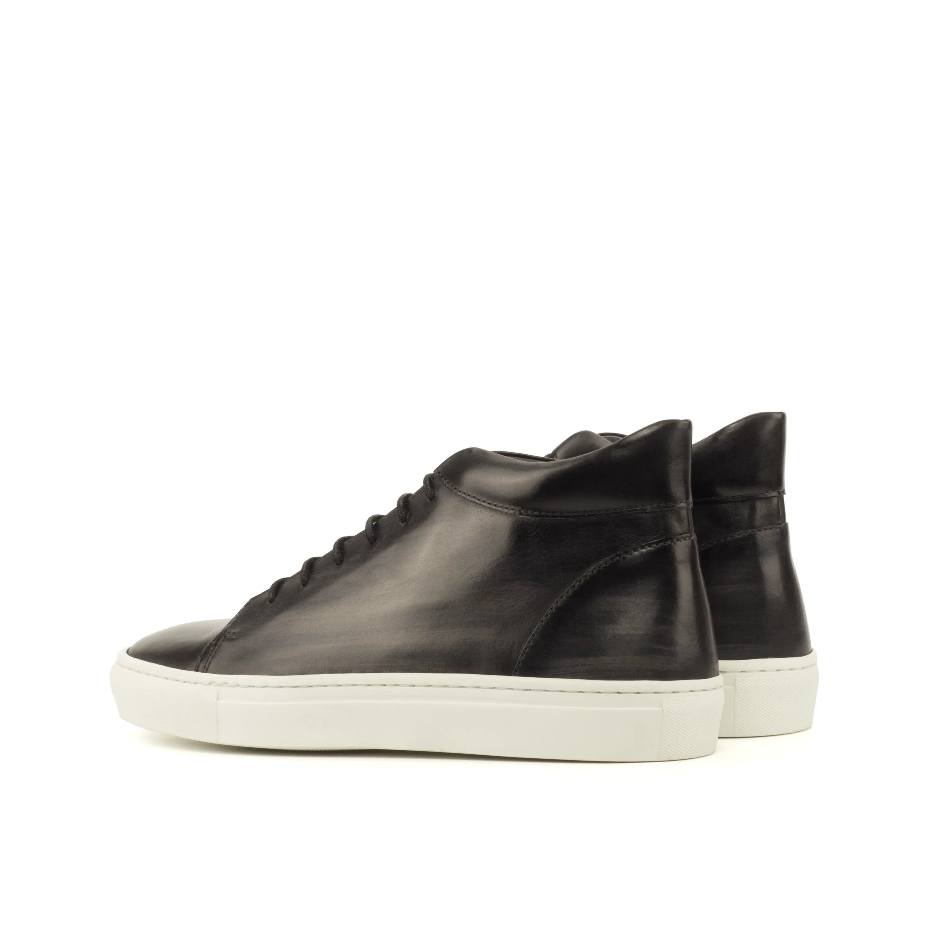 Black leather Donny Patina high top sneakers with a sleek design and modern style
