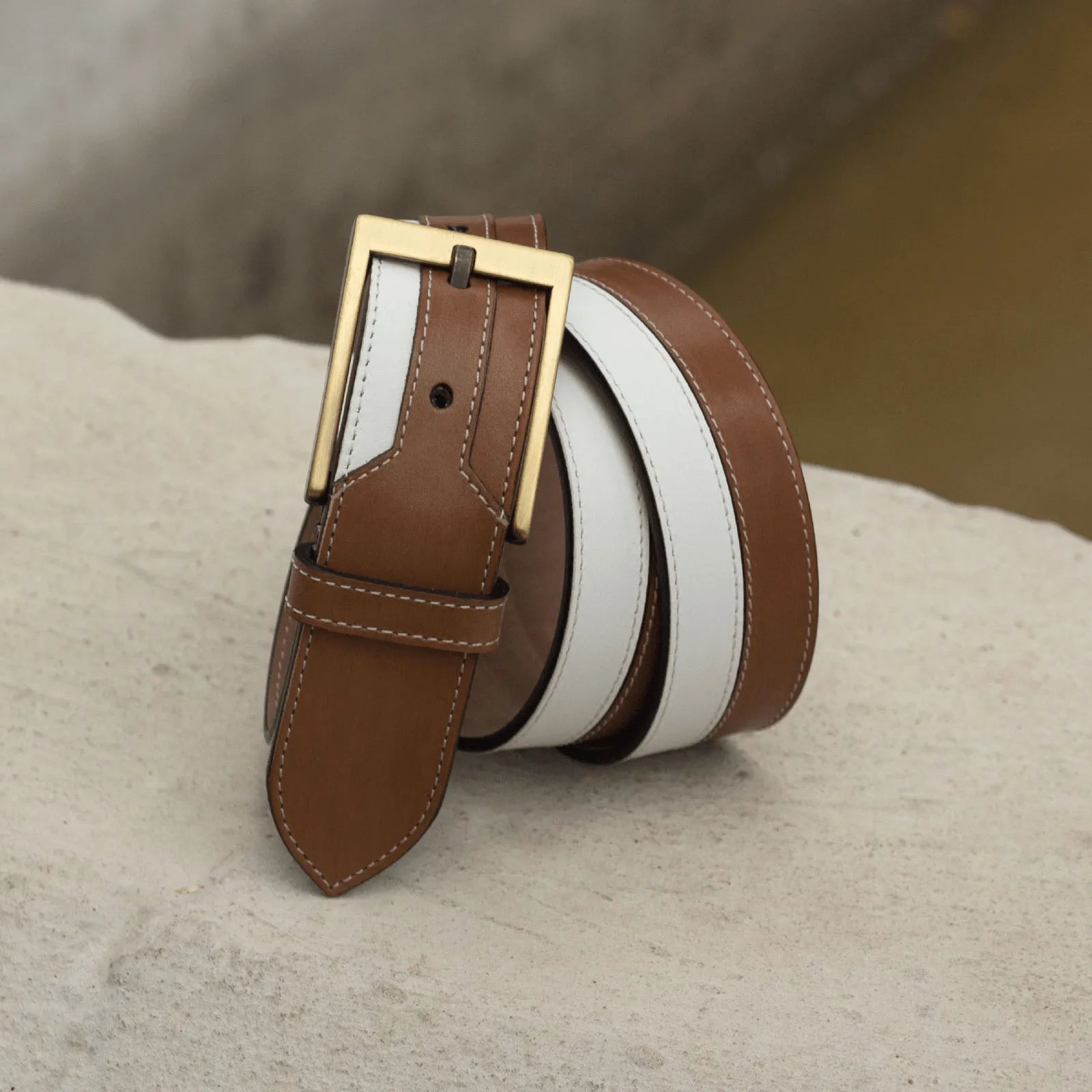 Brown and white leather Dtown Marseille Belt featuring a stylish gold buckle