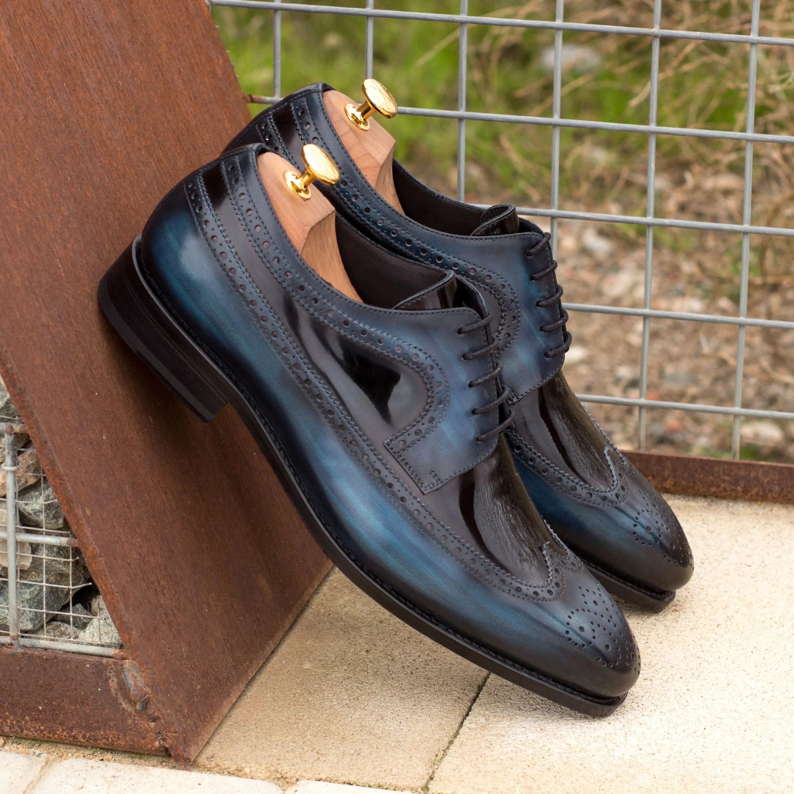 Blue leather Dunne Patina Longwing Blucher dress shoes with elegant wingtip design