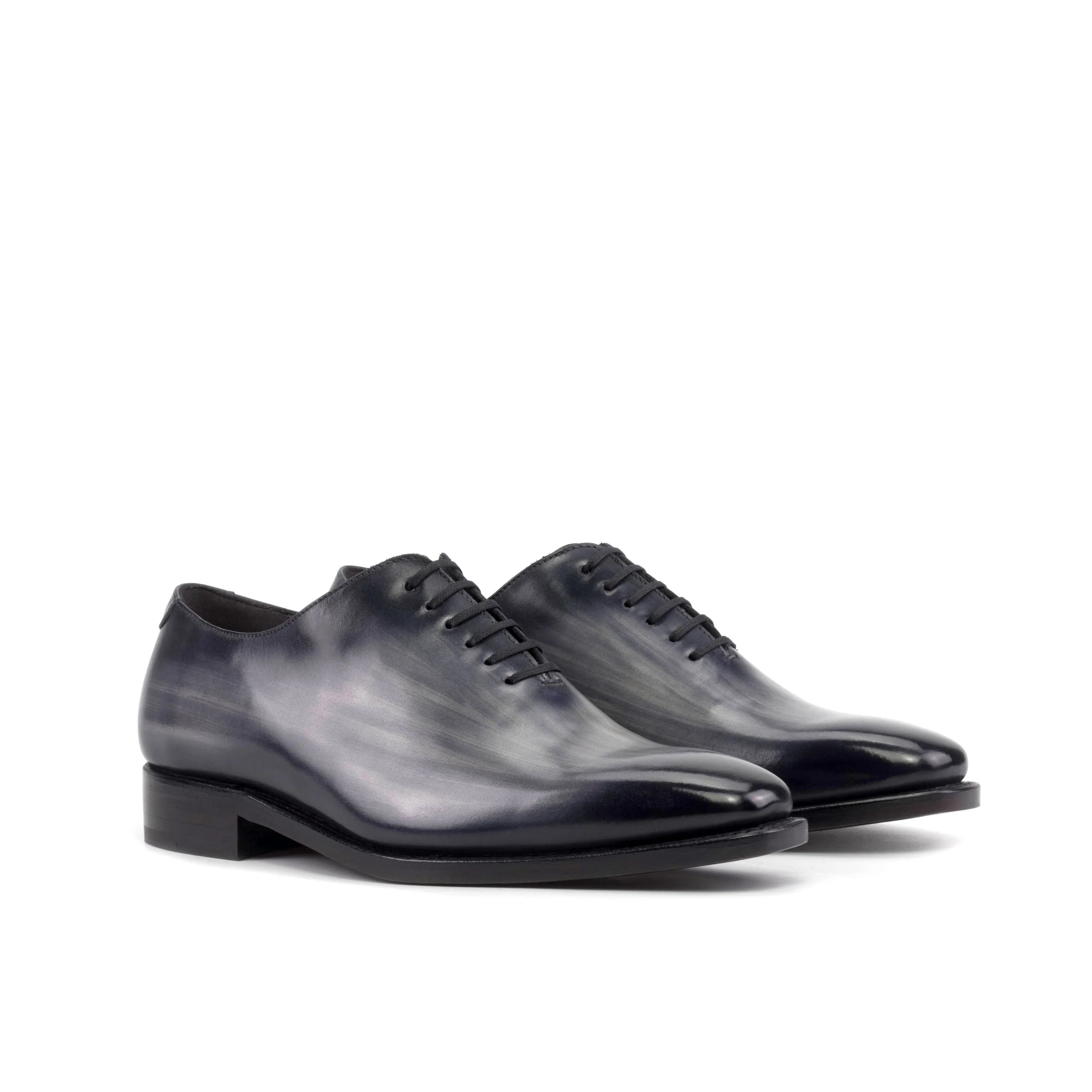 Gray leather dress shoes from the Eclipse Patina Wholecut collection