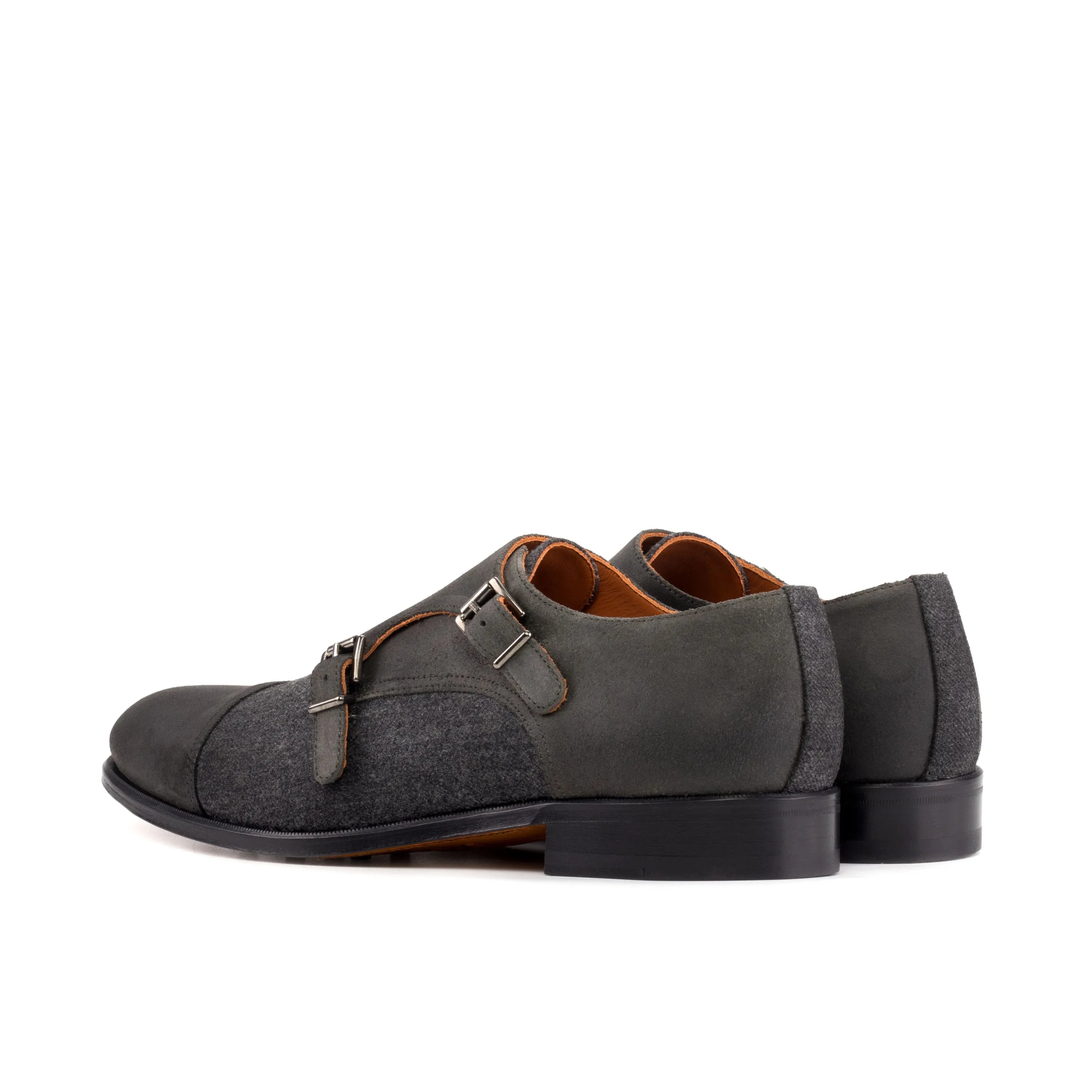 Gray leather Elegancia Double Monk shoes featuring a stylish double monk patina design