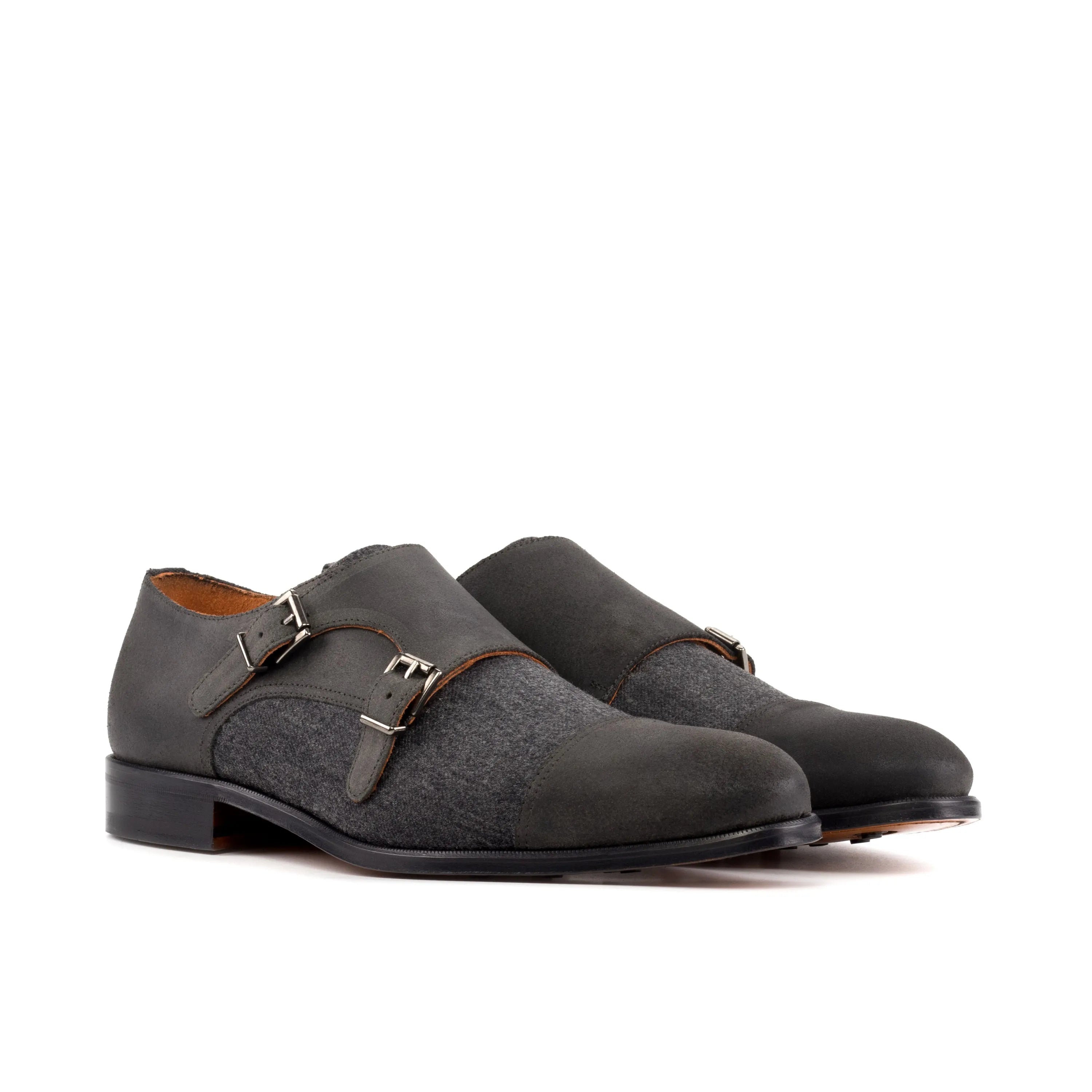 Gray leather Elegancia Double Monk shoes featuring an elegant double monk patina design