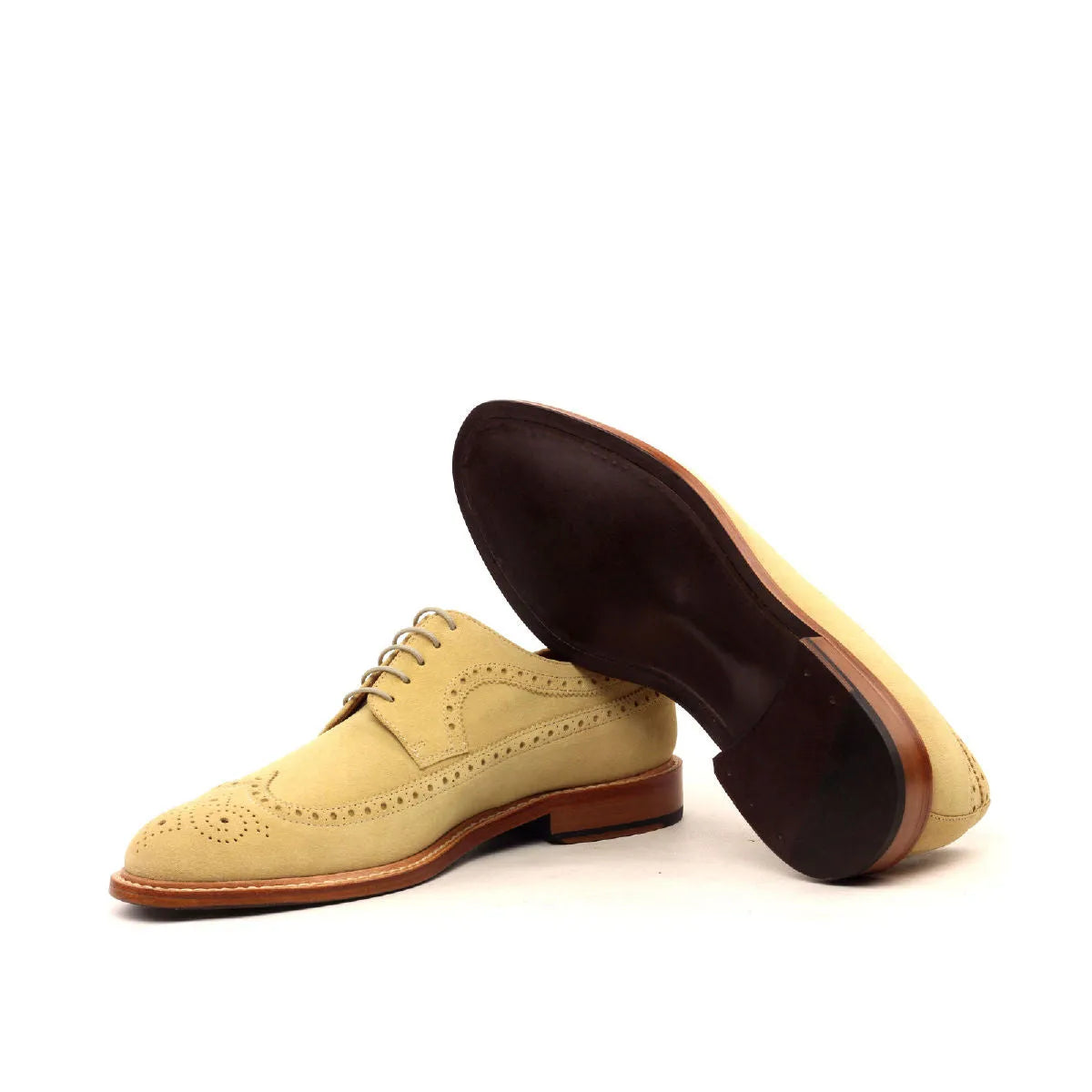 Tan suede Erie Longwing Blucher shoes feature classic wingtip design and elegance