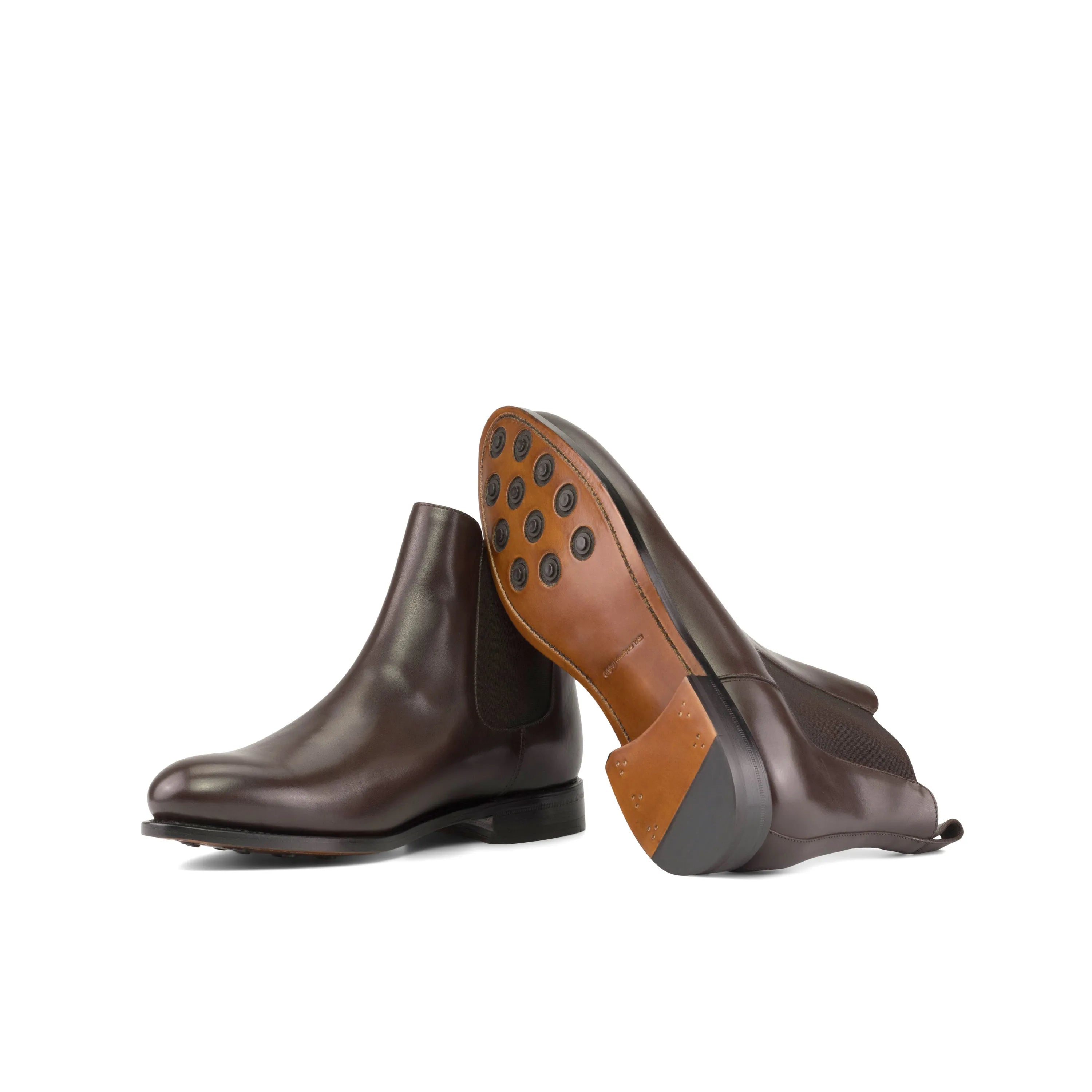 Pair of brown leather Ettore Chelsea Boots for stylish comfort in business days