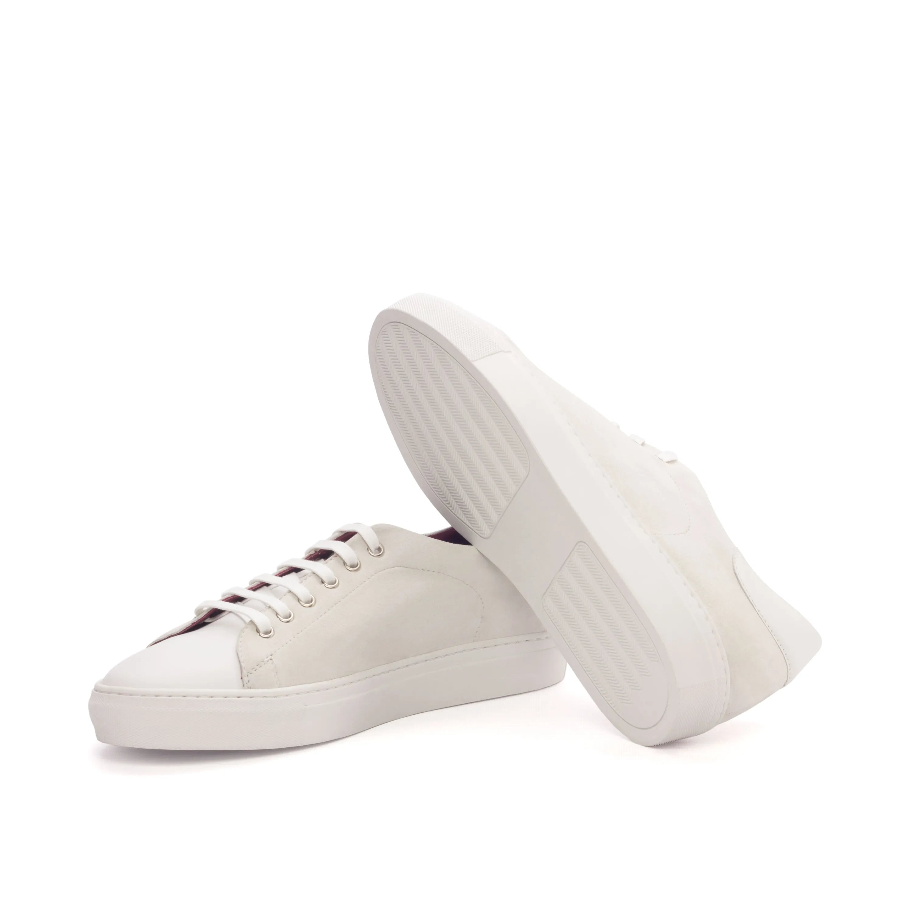 Pair of white leather Evander Trainer Sneakers for stylish and comfortable footwear
