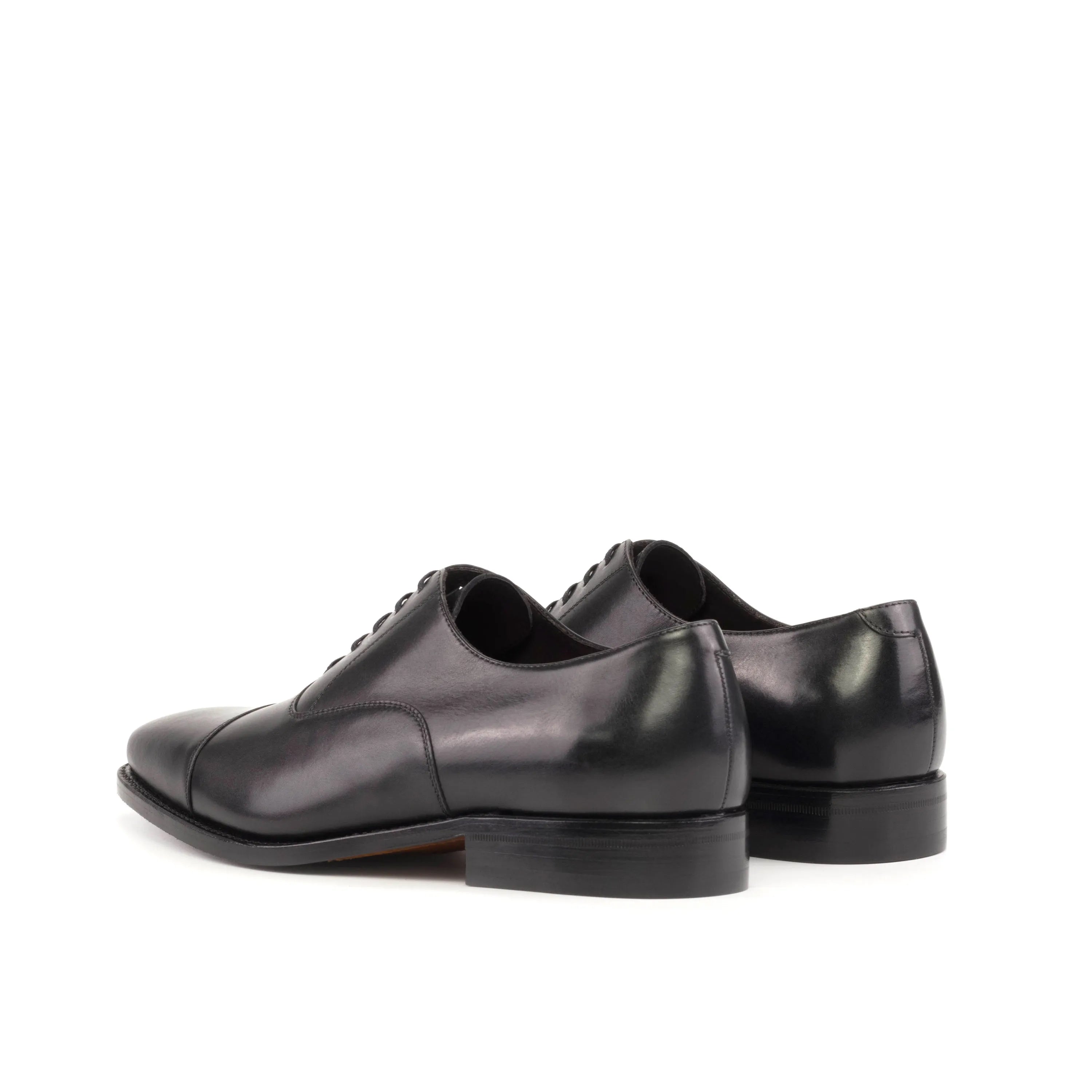 Pair of black leather Farell Oxford shoes for a sophisticated look in the fast lane
