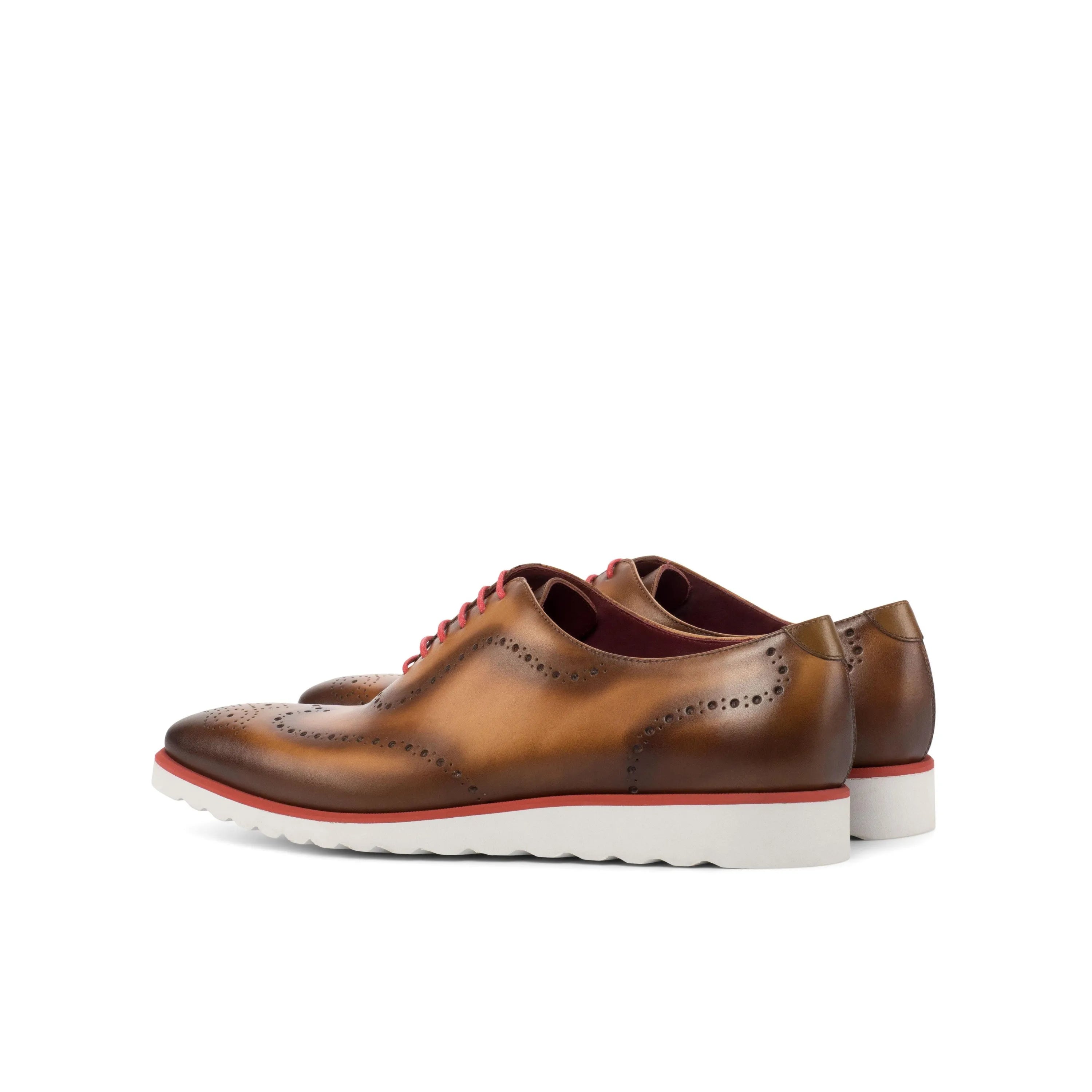 Brown leather wingtip shoes from Faro WholeCut with a sophisticated design