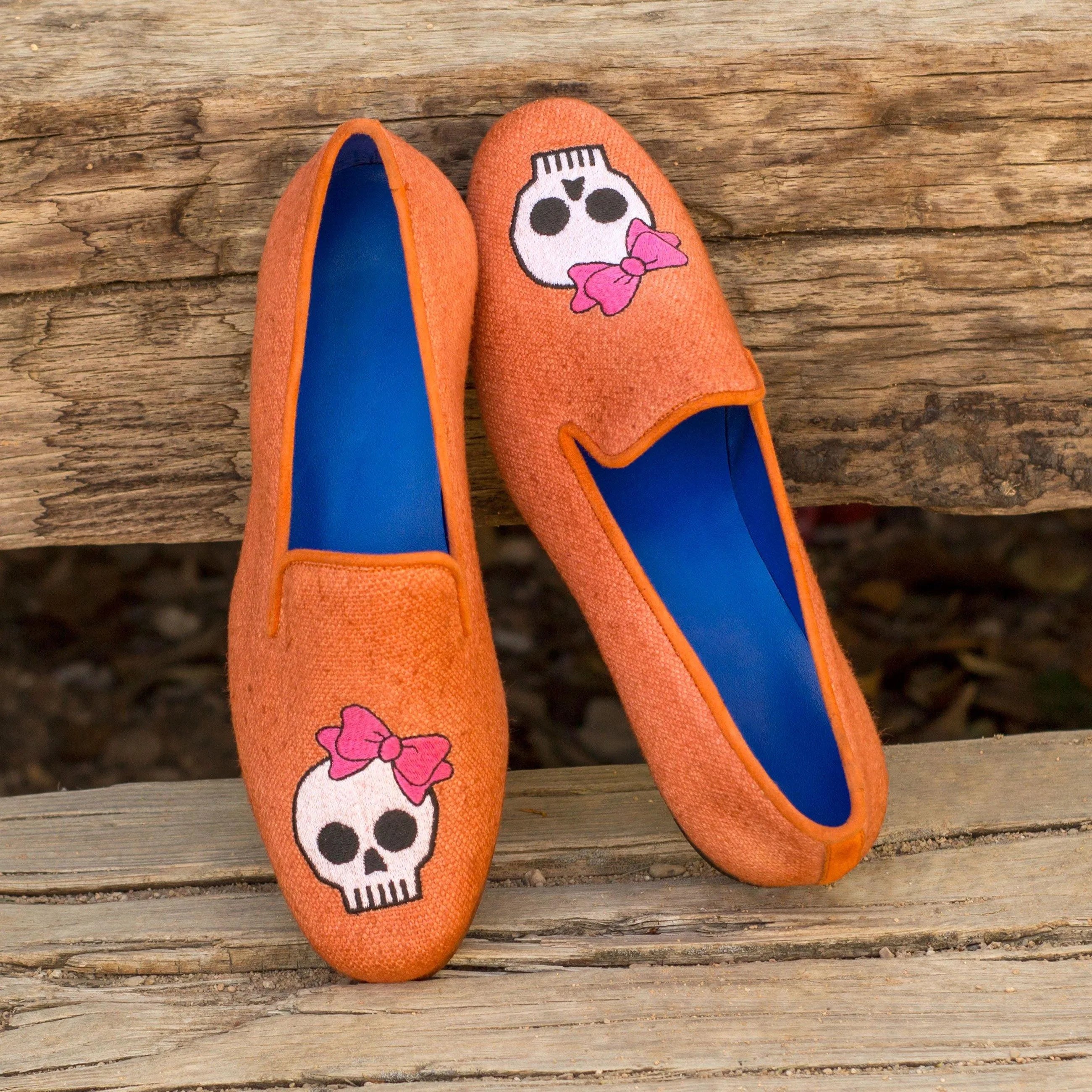 Orange skull-decorated Fero Womens Audrey Slipper, perfect for stylish comfort