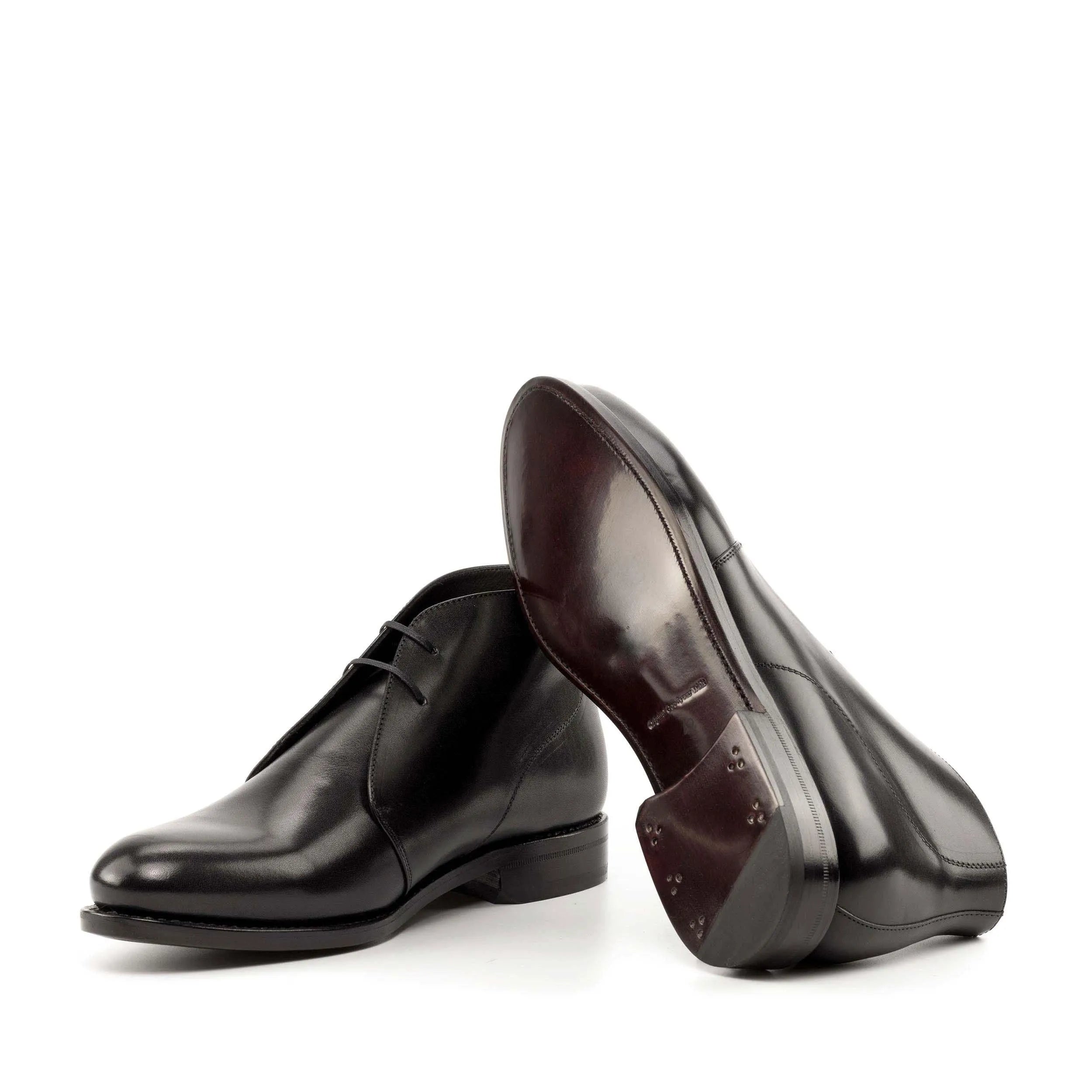 Pair of black leather dress boots featuring Filmar Chukka style for a sophisticated look