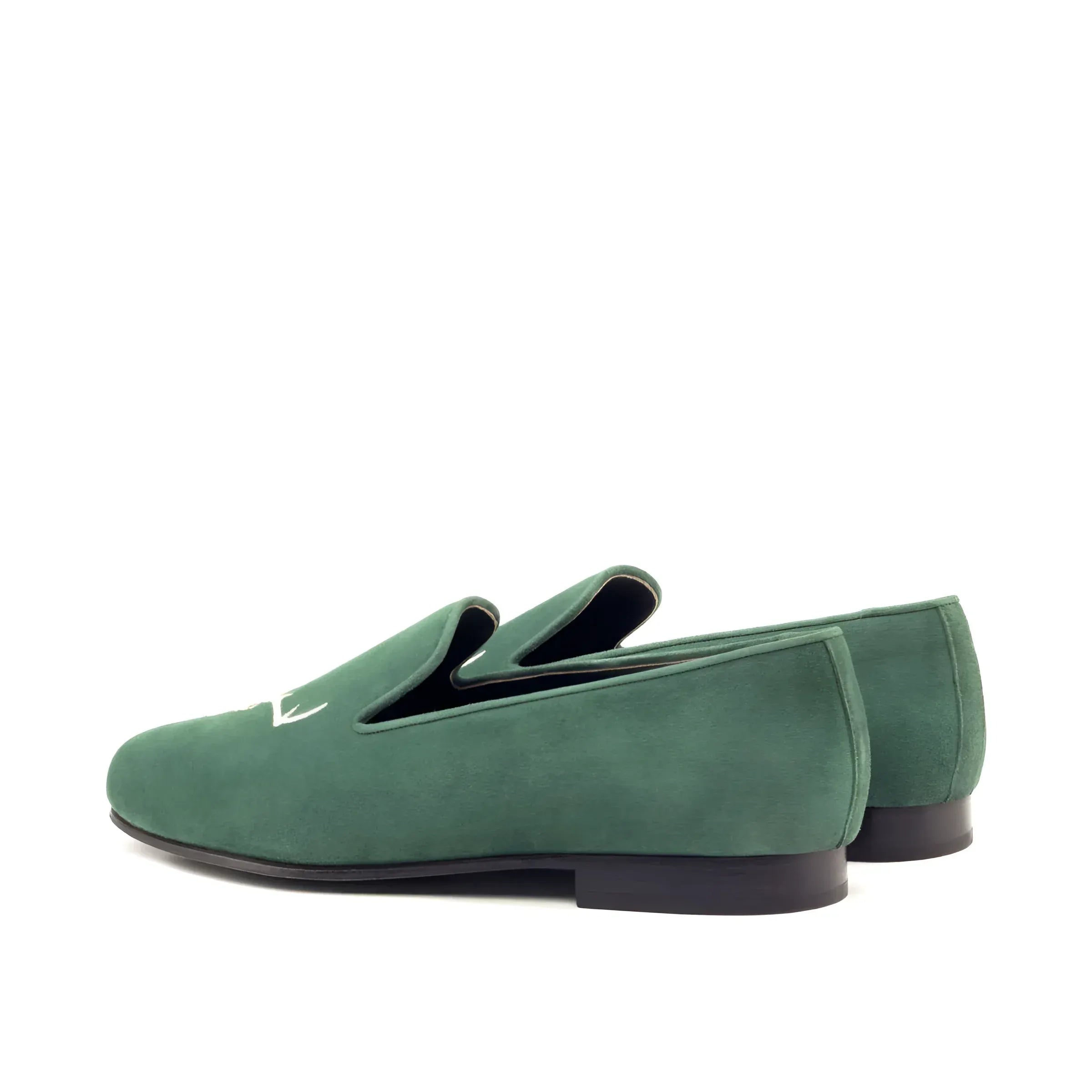 Green suede loafers from Forst Wellington, showcasing the elegant Wellington slip design