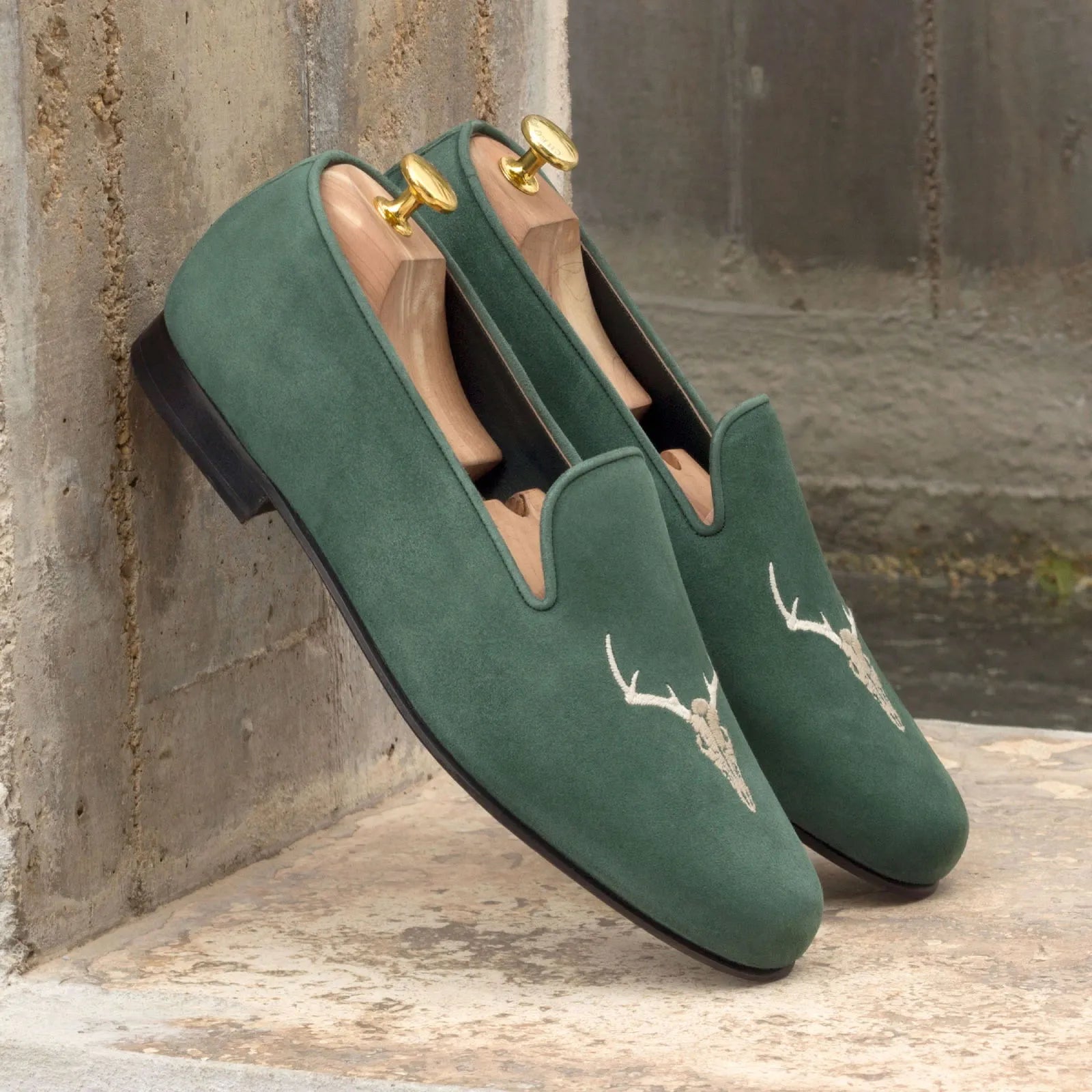 Green suede loafers with deer embroidery from Forst Wellington slip collection
