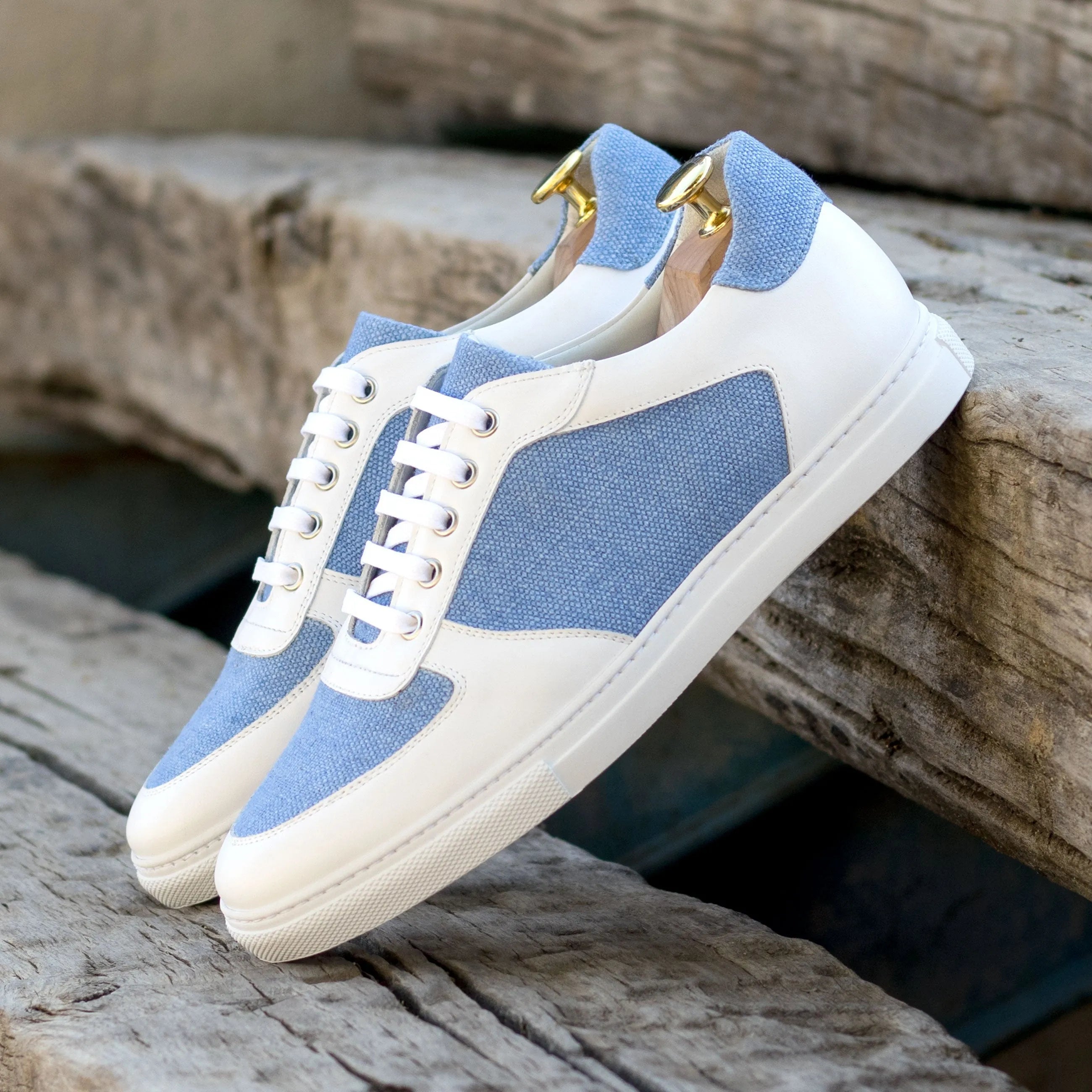 Blue and white G49 Low Top Sneakers showcasing luxury bespoke shoes for men