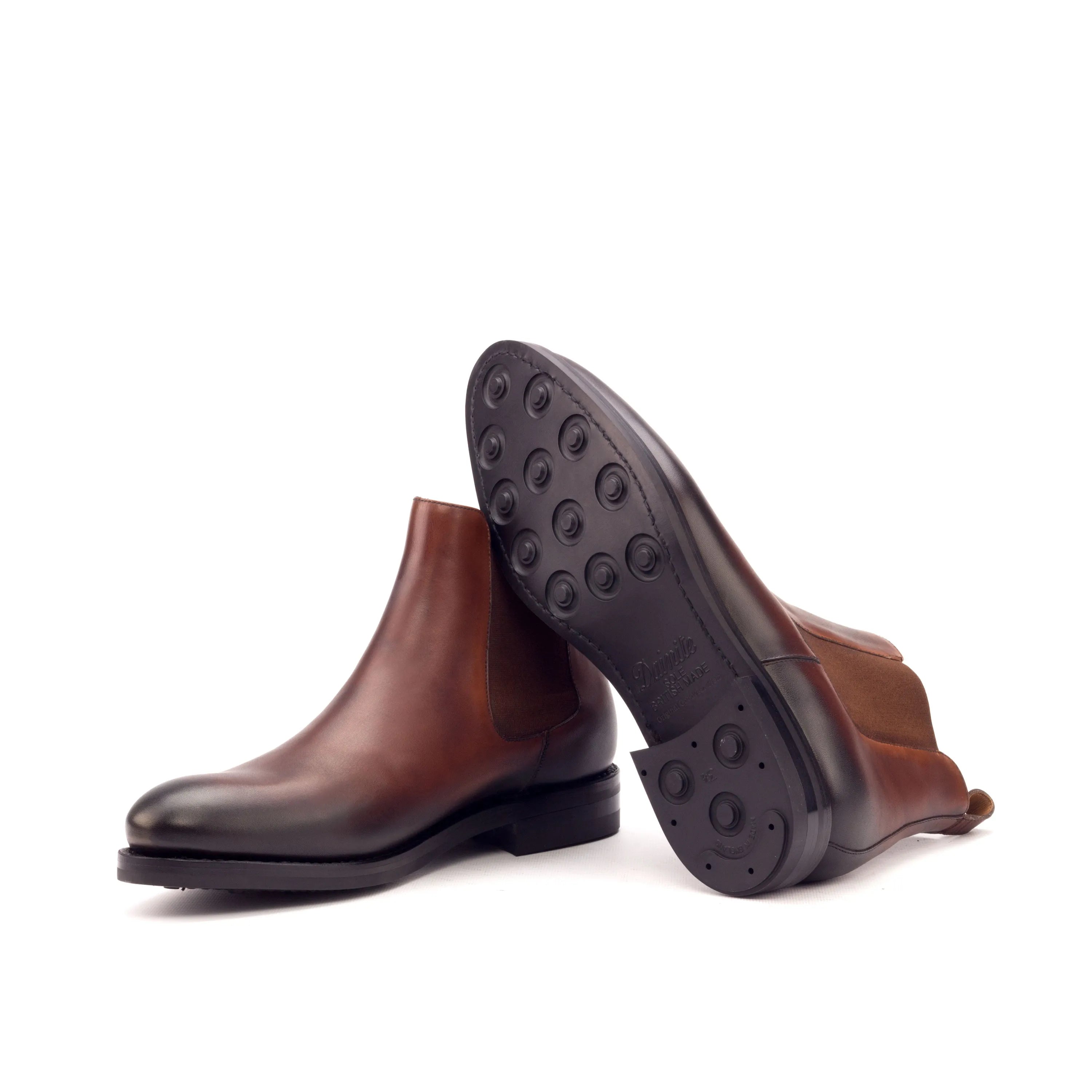 Pair of brown leather Gall Chelsea Boots for stylish and versatile footwear options