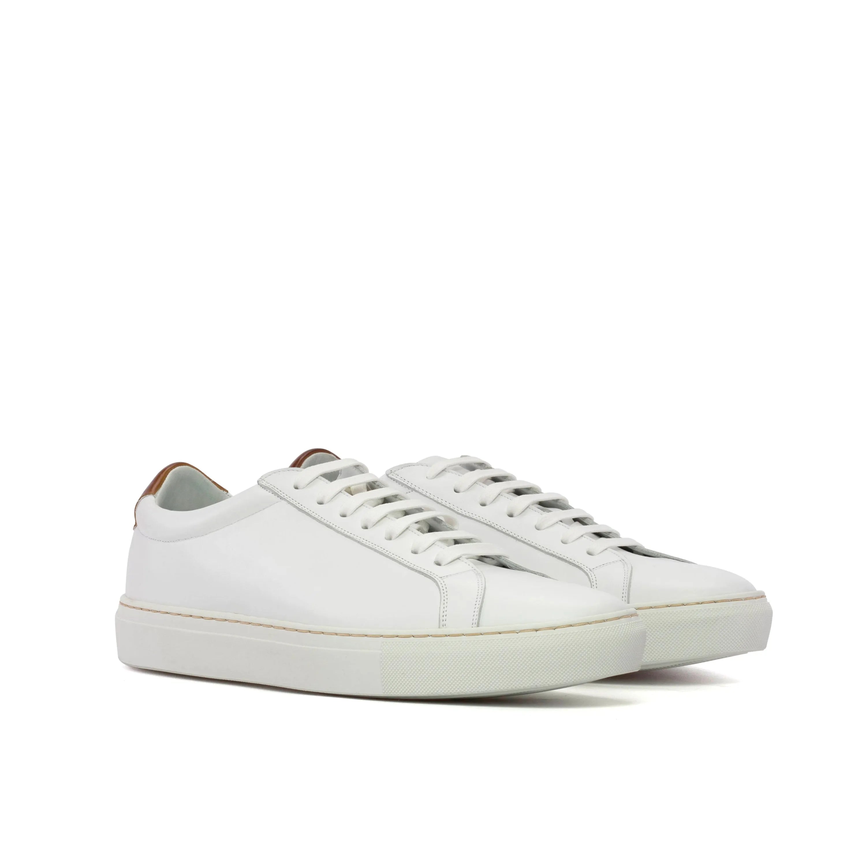 Pair of Garry V2 low kick sneakers made of premium white calf leather