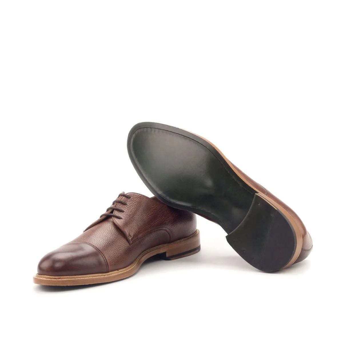 Brown leather Gavins Derby shoes showcasing a classic patina and refined split toe design