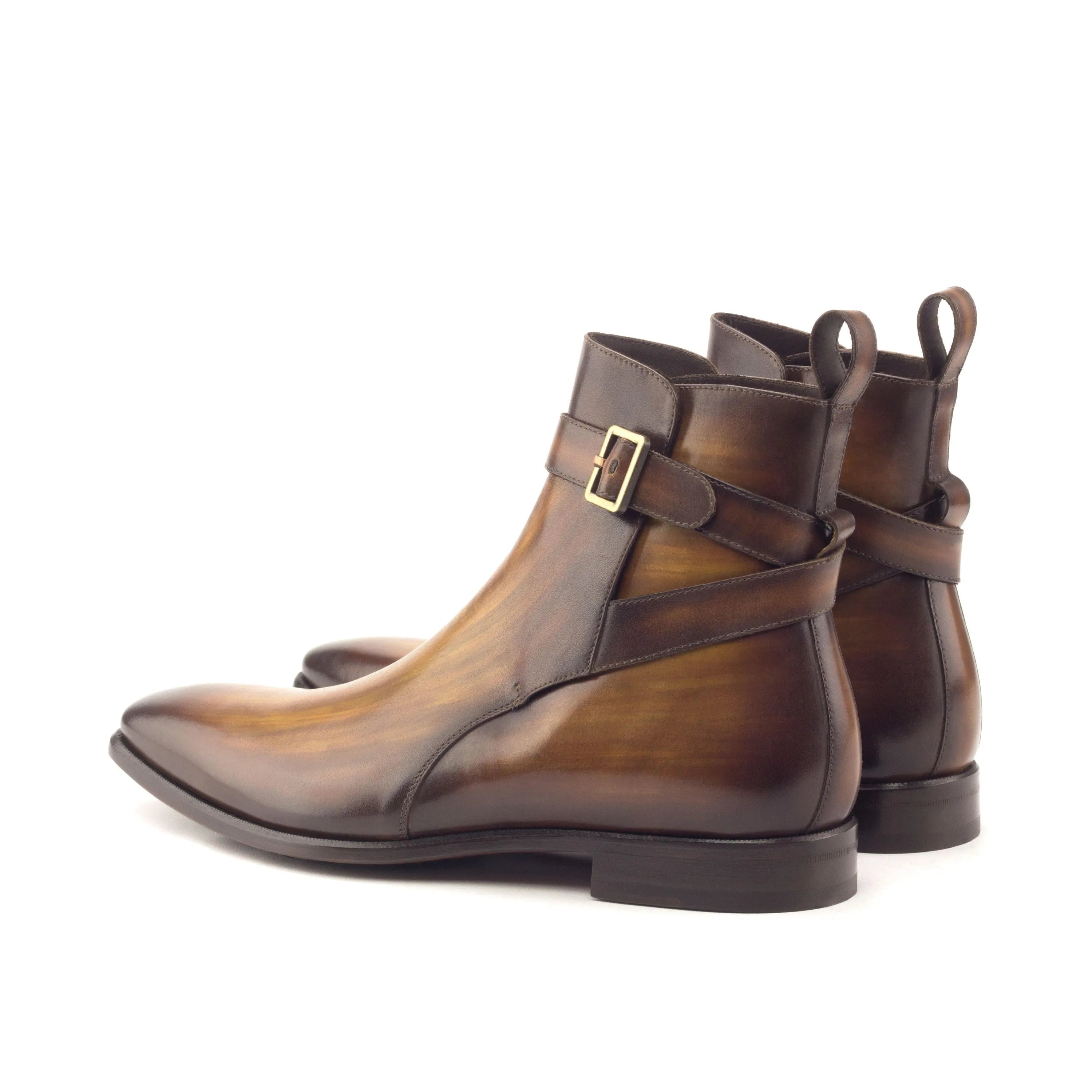Brown leather ankle boots with buckle, showcasing GEO Jodhpur Patina Boots style