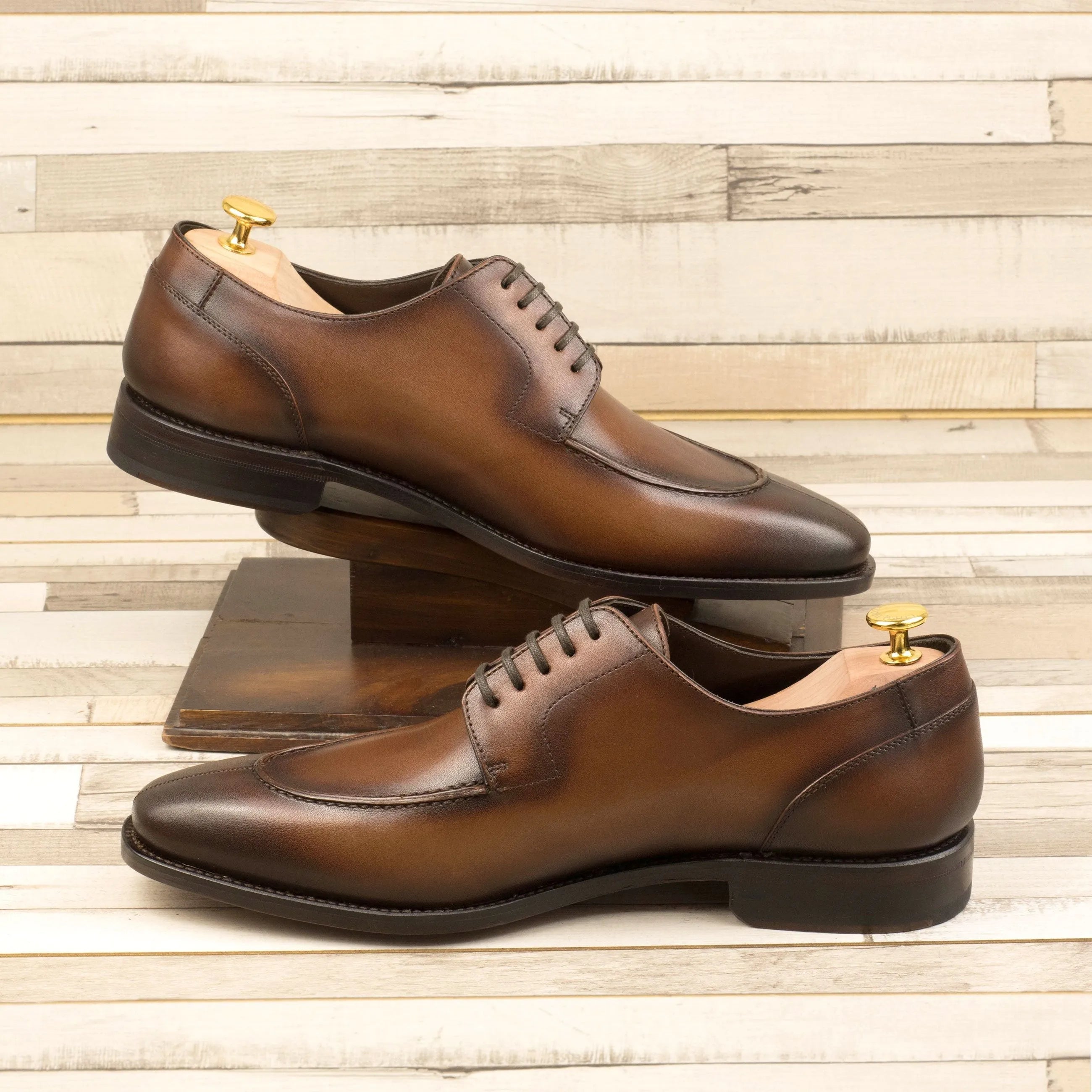 Pair of brown leather dress shoes, George Derby Split Toe style, featuring classic split toe design