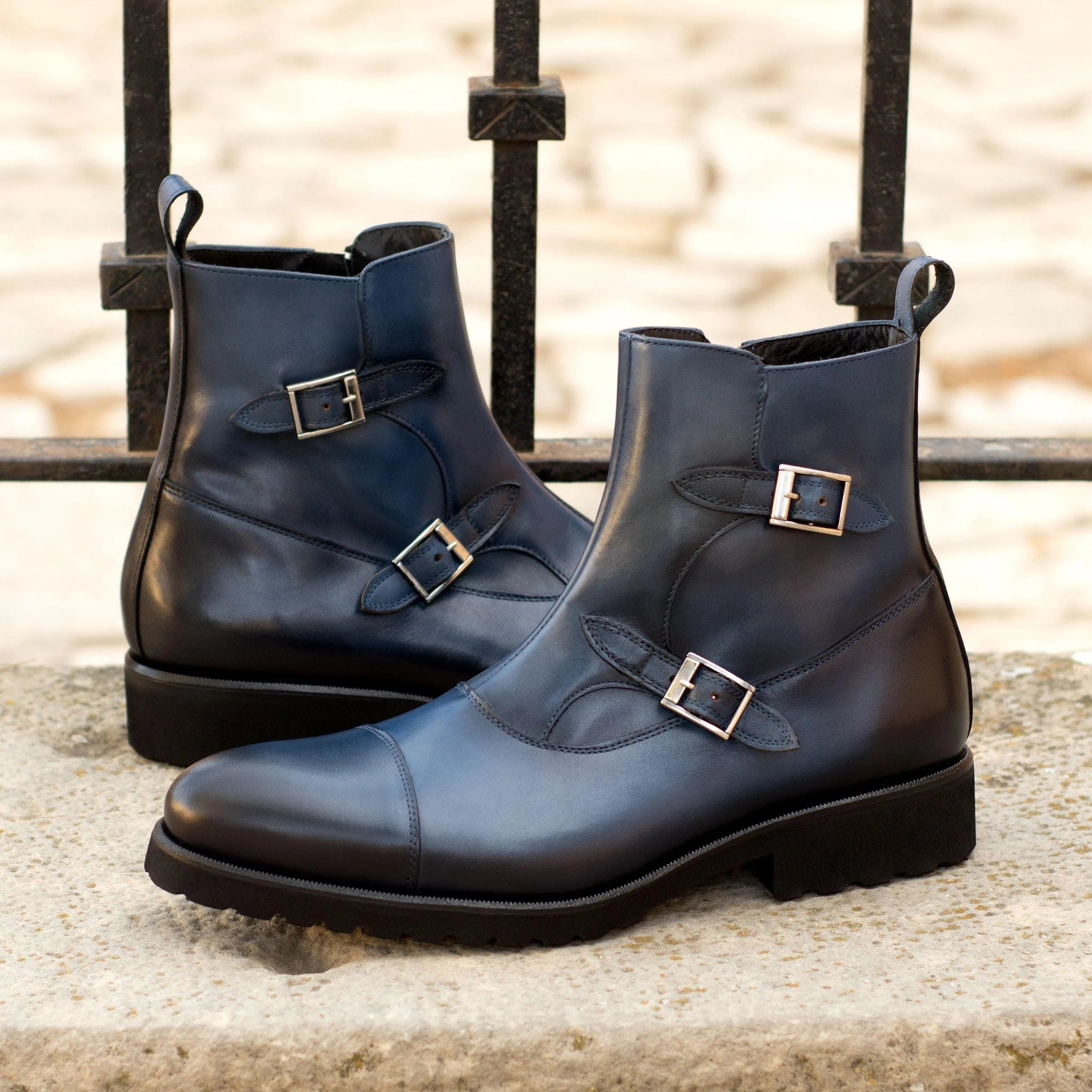 Blue leather Georgino Octavian Boots featuring a stylish monk strap design
