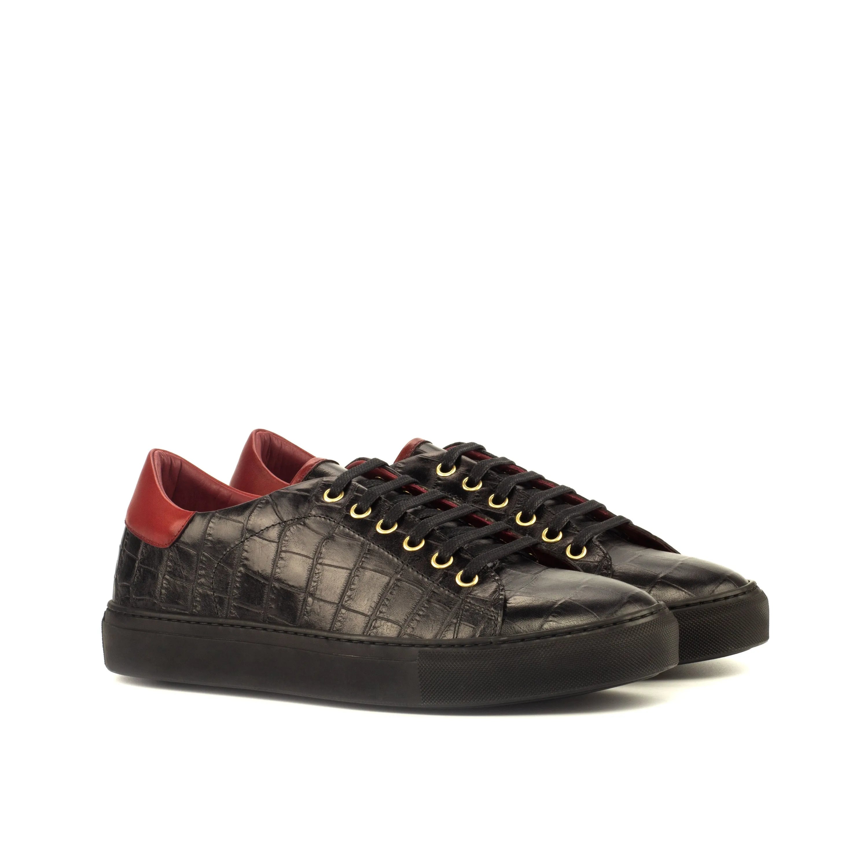 Black leather Ghadi Trainer Sneaker featuring a striking red heel design