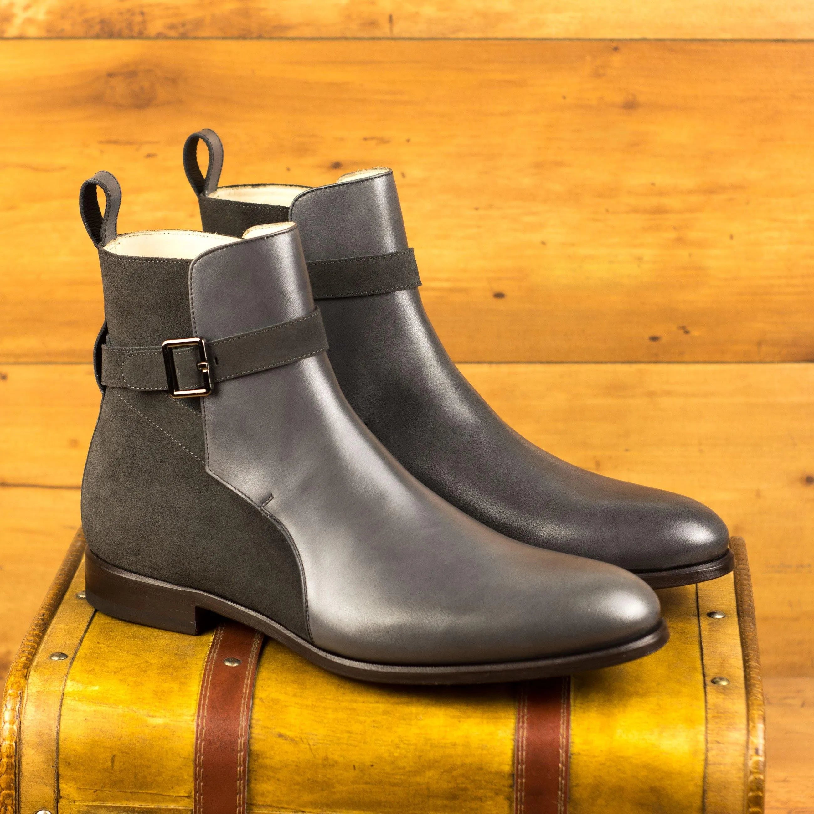 Pair of gray leather Giliano Jodhpur Boots elegantly displayed for stylish footwear choices