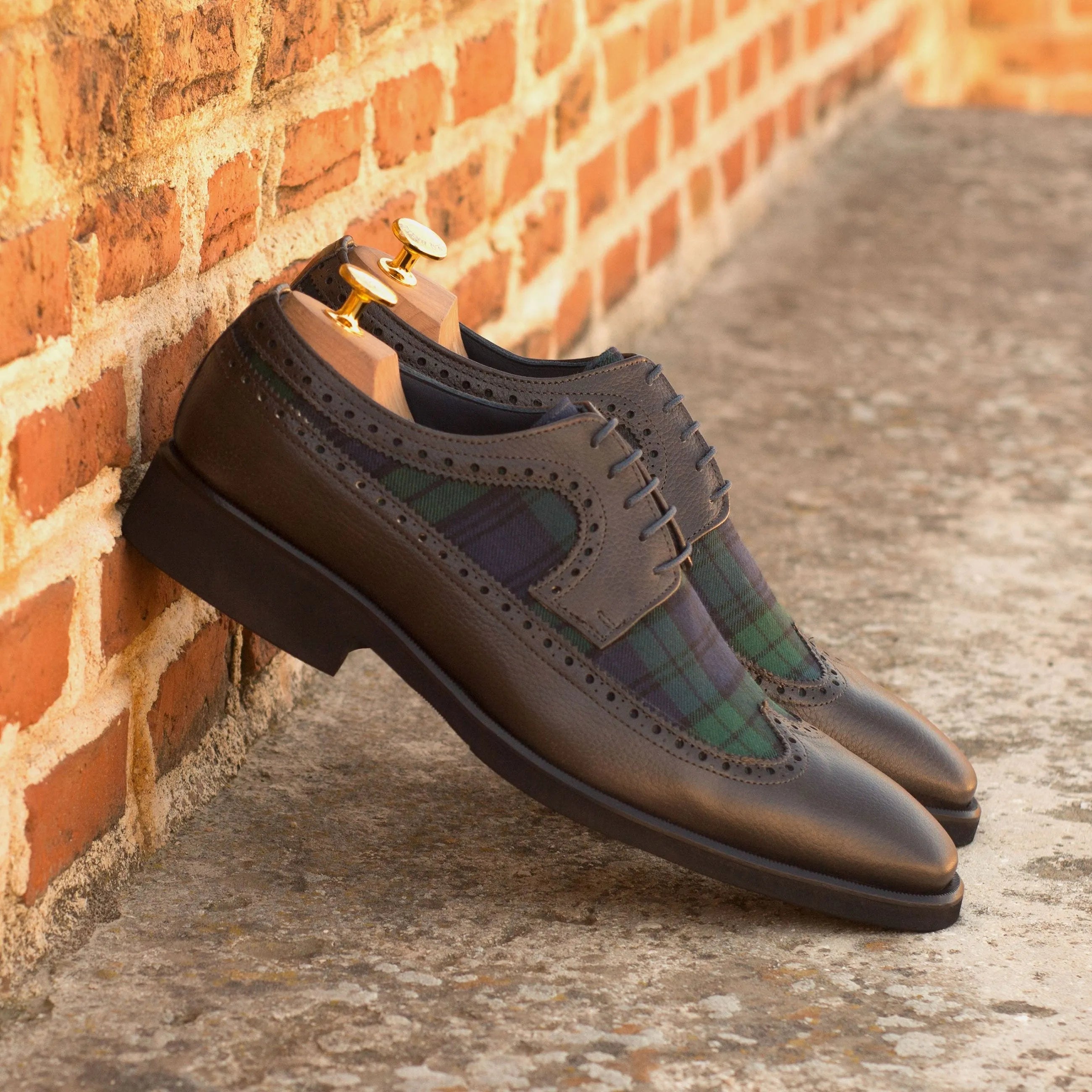 Brown leather and plaid dress shoes, featuring GM05 Longwing Blucher design