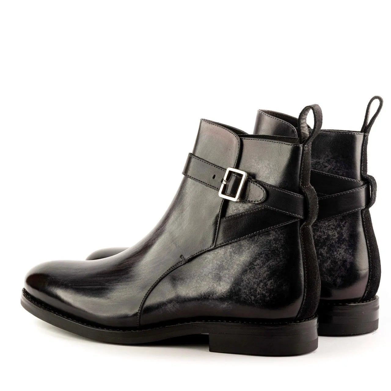 Black leather buckle boots from the Greco Jodhpur Patina collection showcasing style
