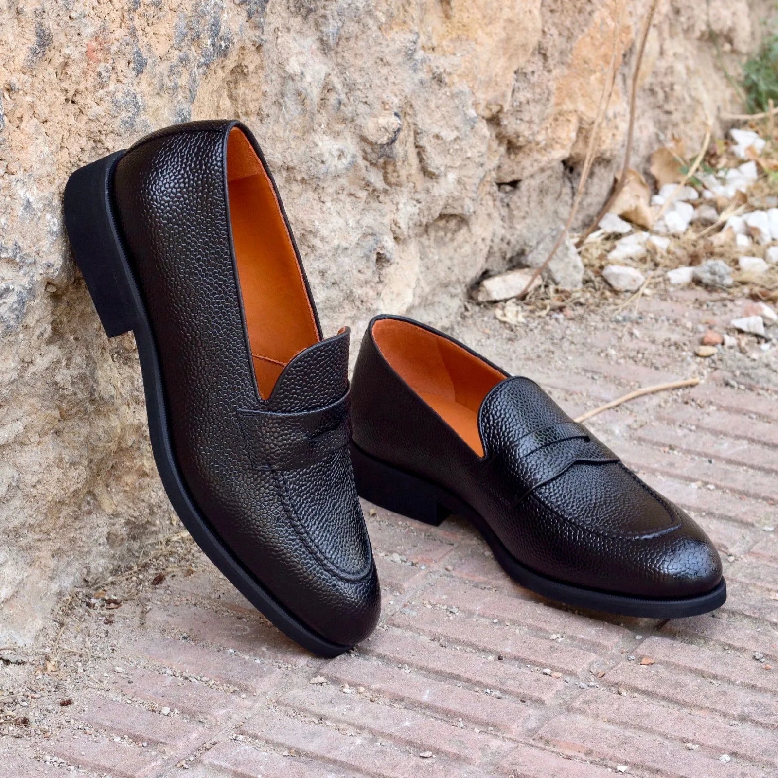 Pair of Haaz Loafers, luxury bespoke shoes for men, showcasing elegant black leather