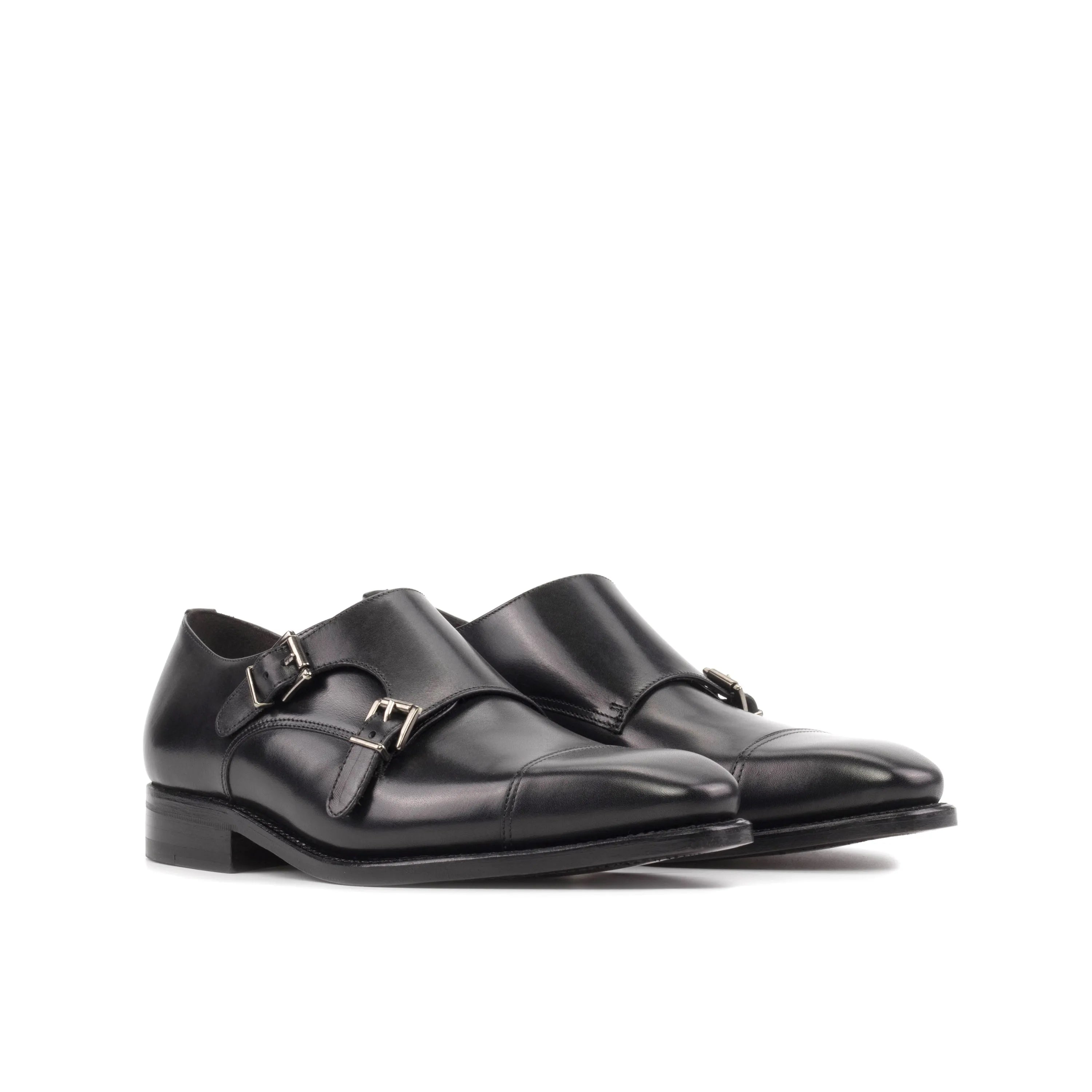 Pair of black leather monk strap shoes Havanas Double Monk ideal for fast lane business days