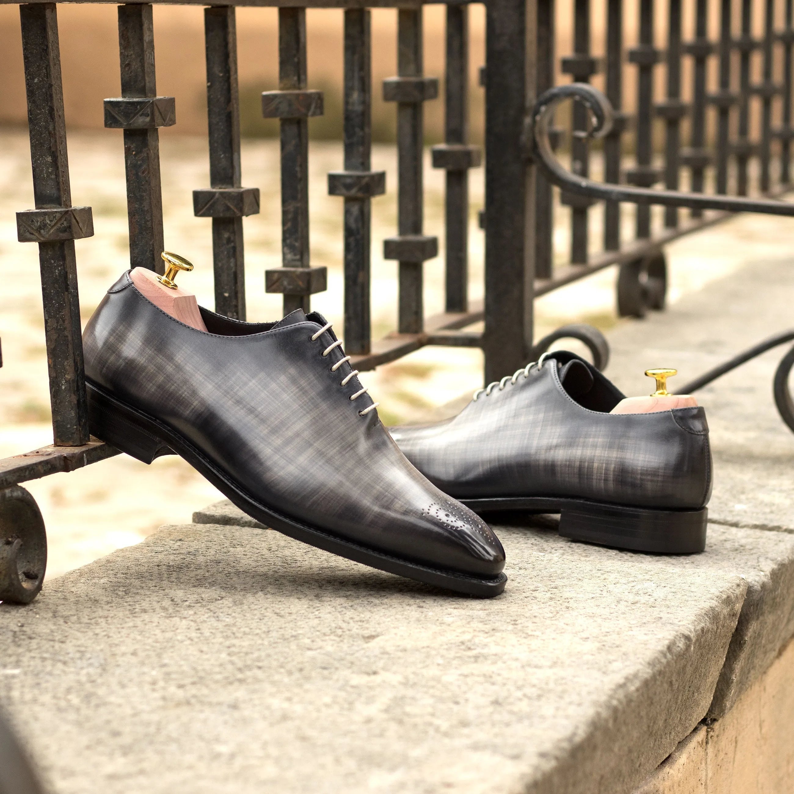 Gray leather Havier whole cut patina shoes ideal for formal occasions and stylish ensembles
