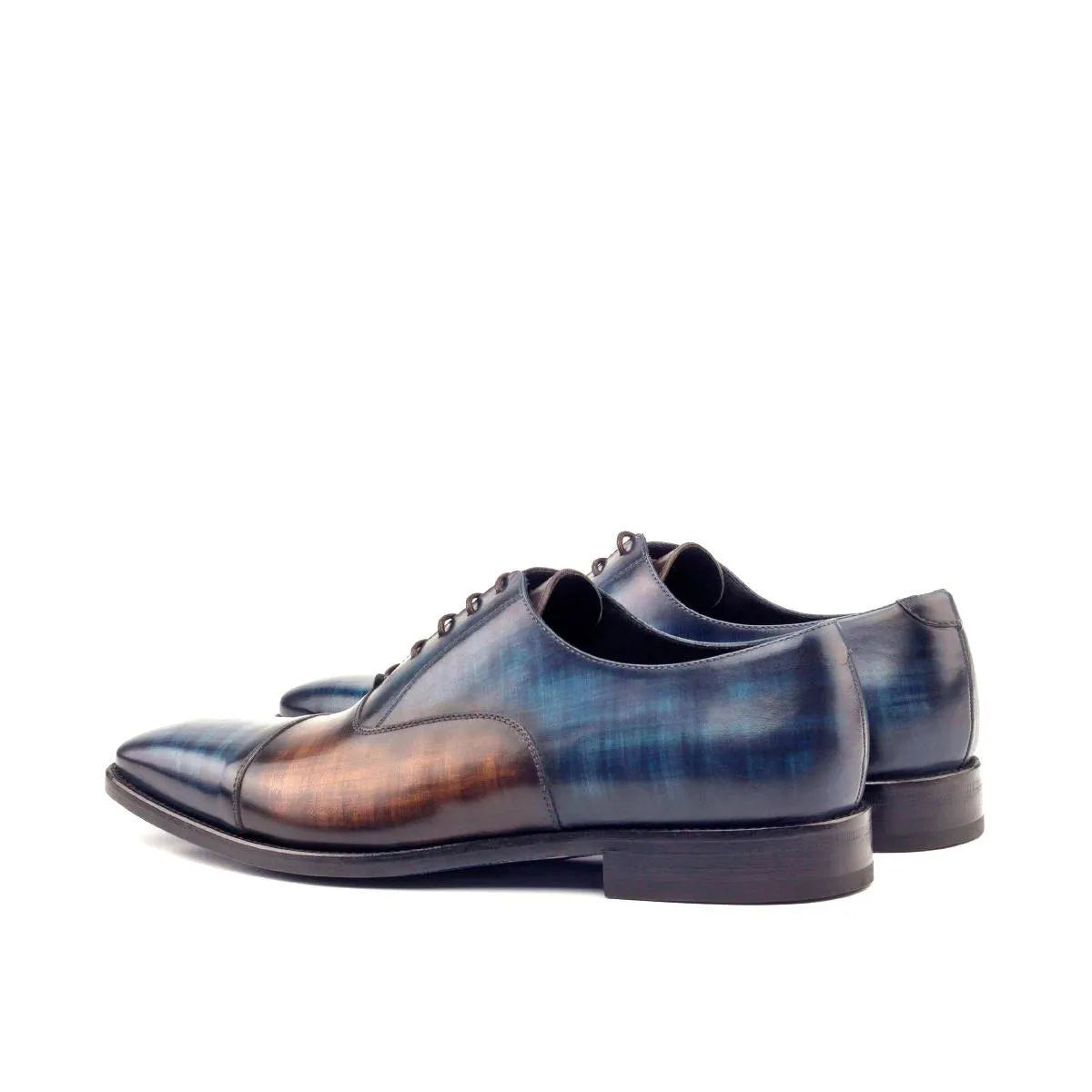 Two-toned leather Heartland Oxford patina shoes displayed elegantly