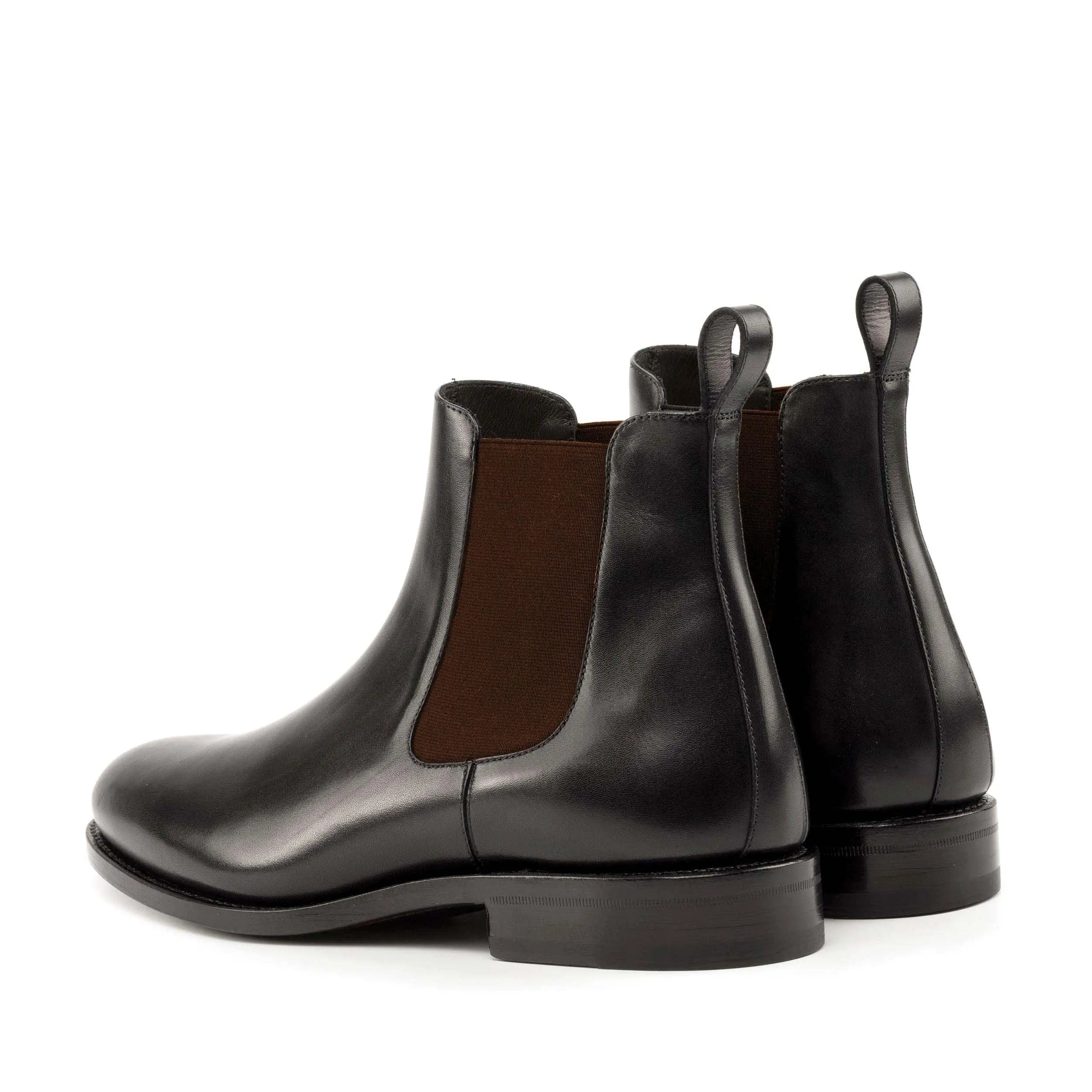 Pair of black leather Henrystar Chelsea Boots ideal for a fast lane lifestyle