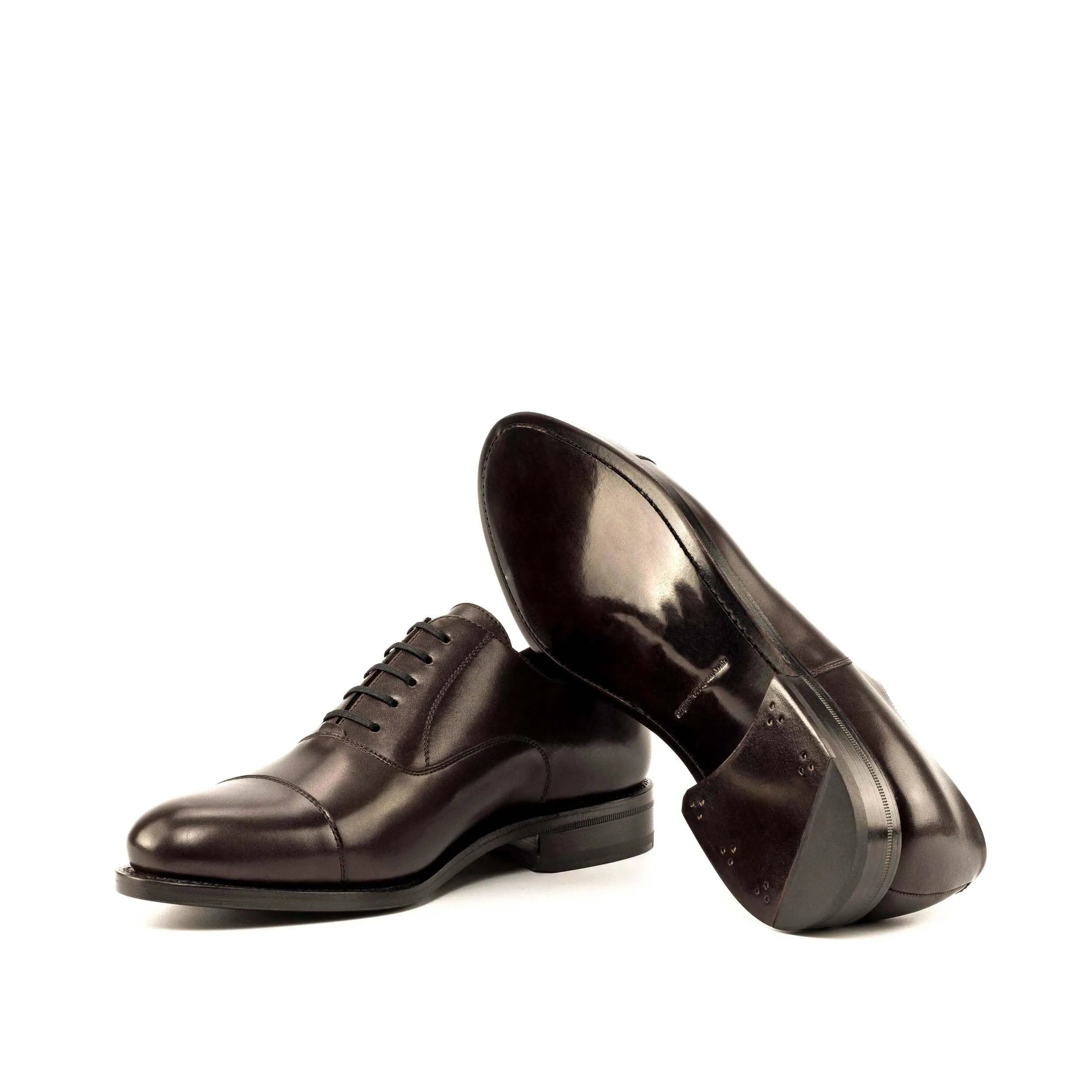 Pair of brown leather Hildon Oxford shoes showcased in the Fast Lane collection