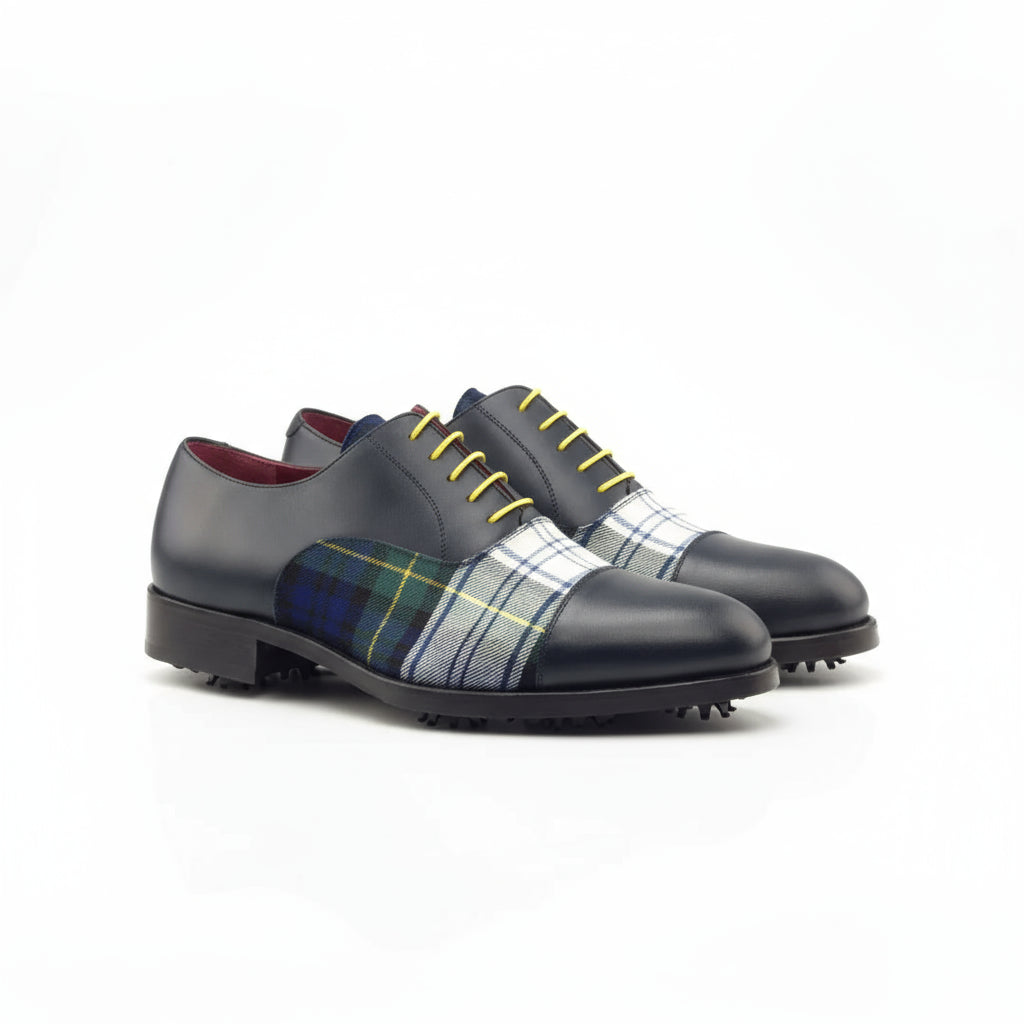 Black leather Hogan Oxford golf shoes featuring plaid accents for stylish performance