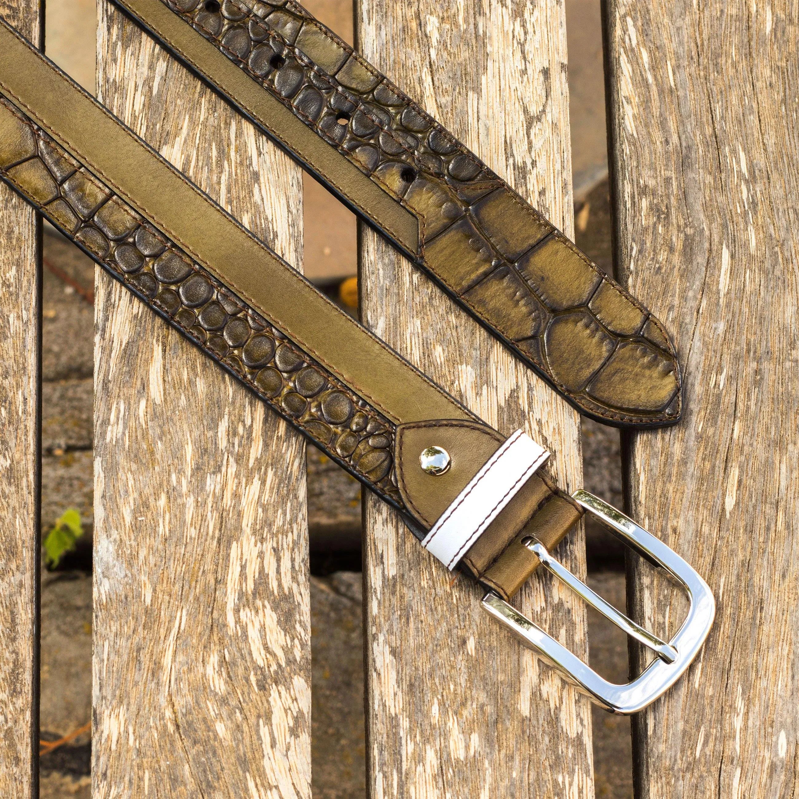 Olive green crocodile-patterned Howard Marseille Belt showcasing luxury and style