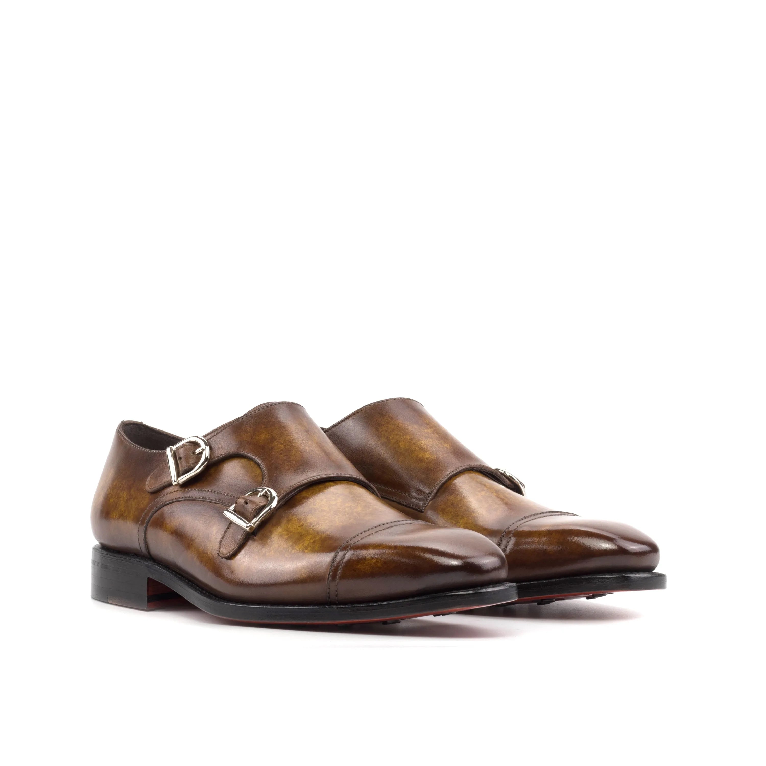 Pair of brown leather Imperial Patina Double Monk strap shoes for elegant style