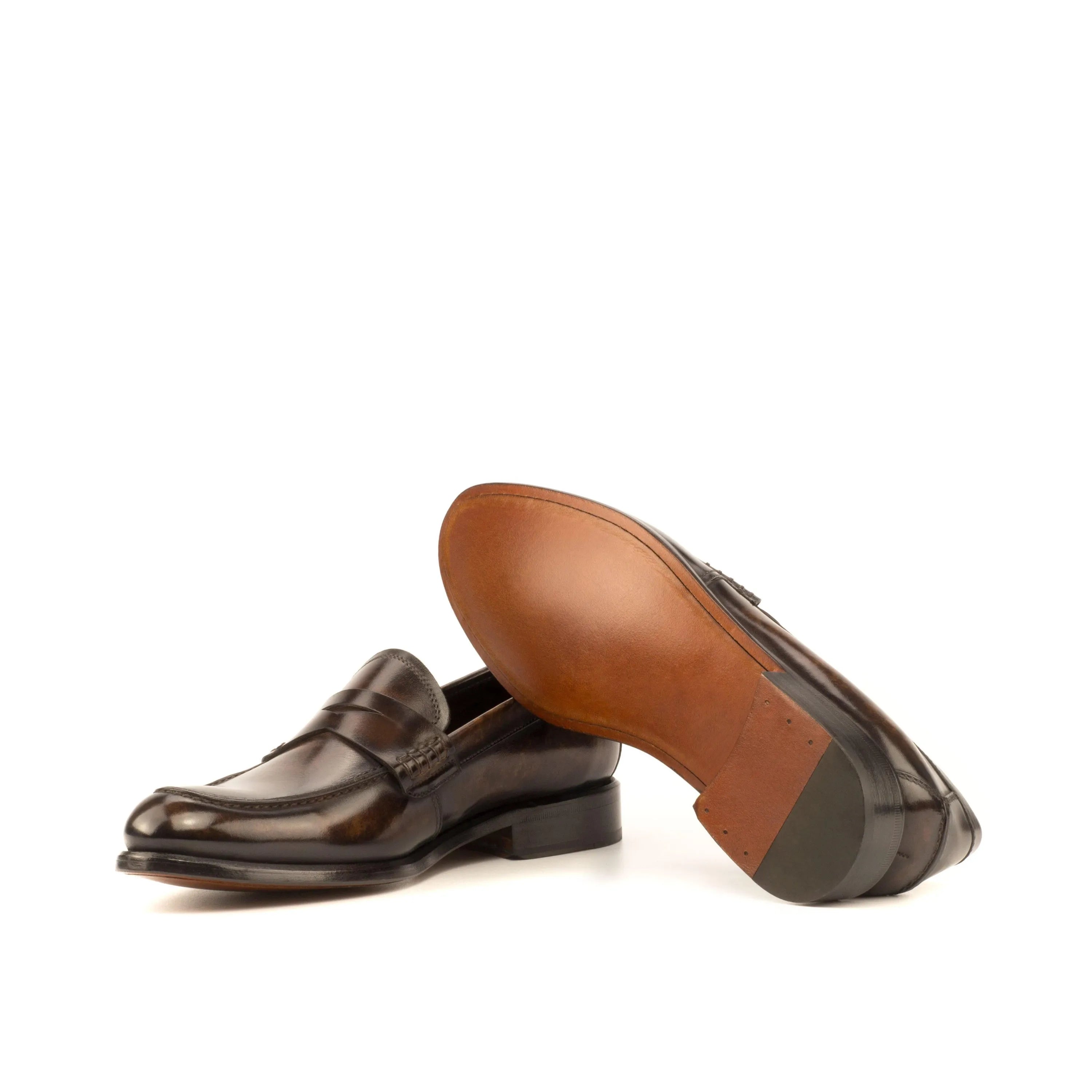 Pair of brown leather Indi Ladies Patina Loafers II showcasing elegant style and comfort