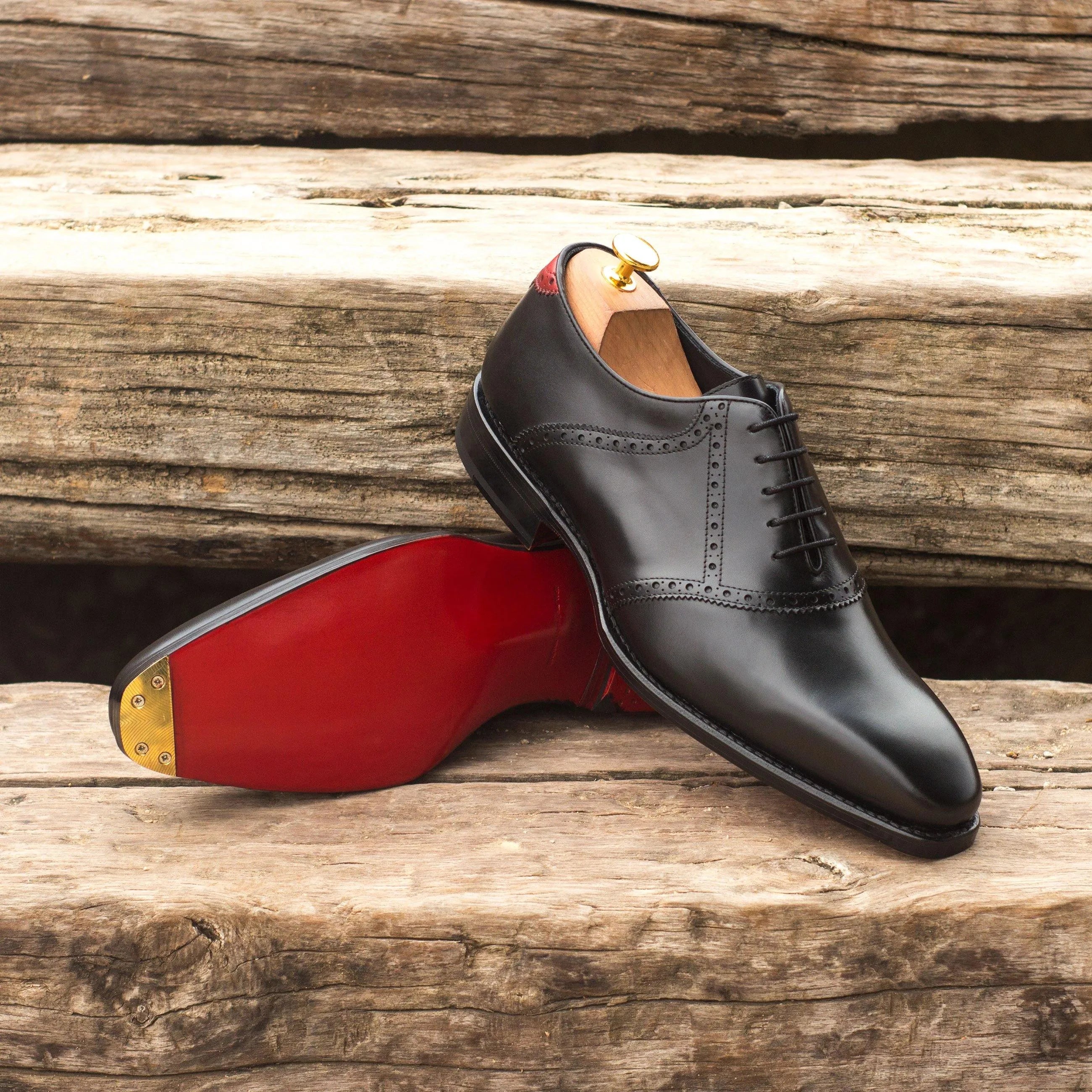 Black leather saddle shoes with red soles, the stylish Iron Saddle shoes for men