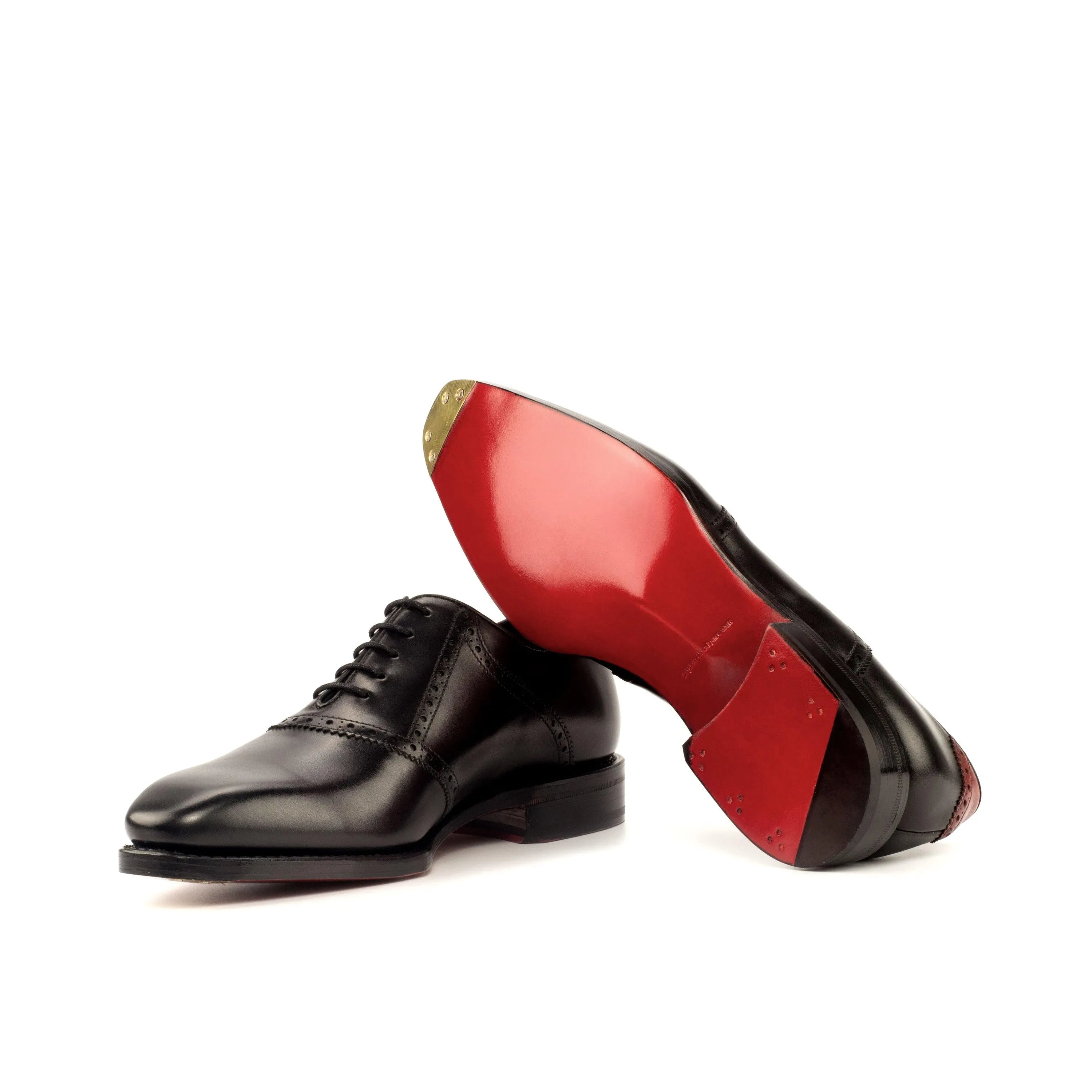 Black leather Iron Saddle shoes featuring distinctive red soles for a stylish look