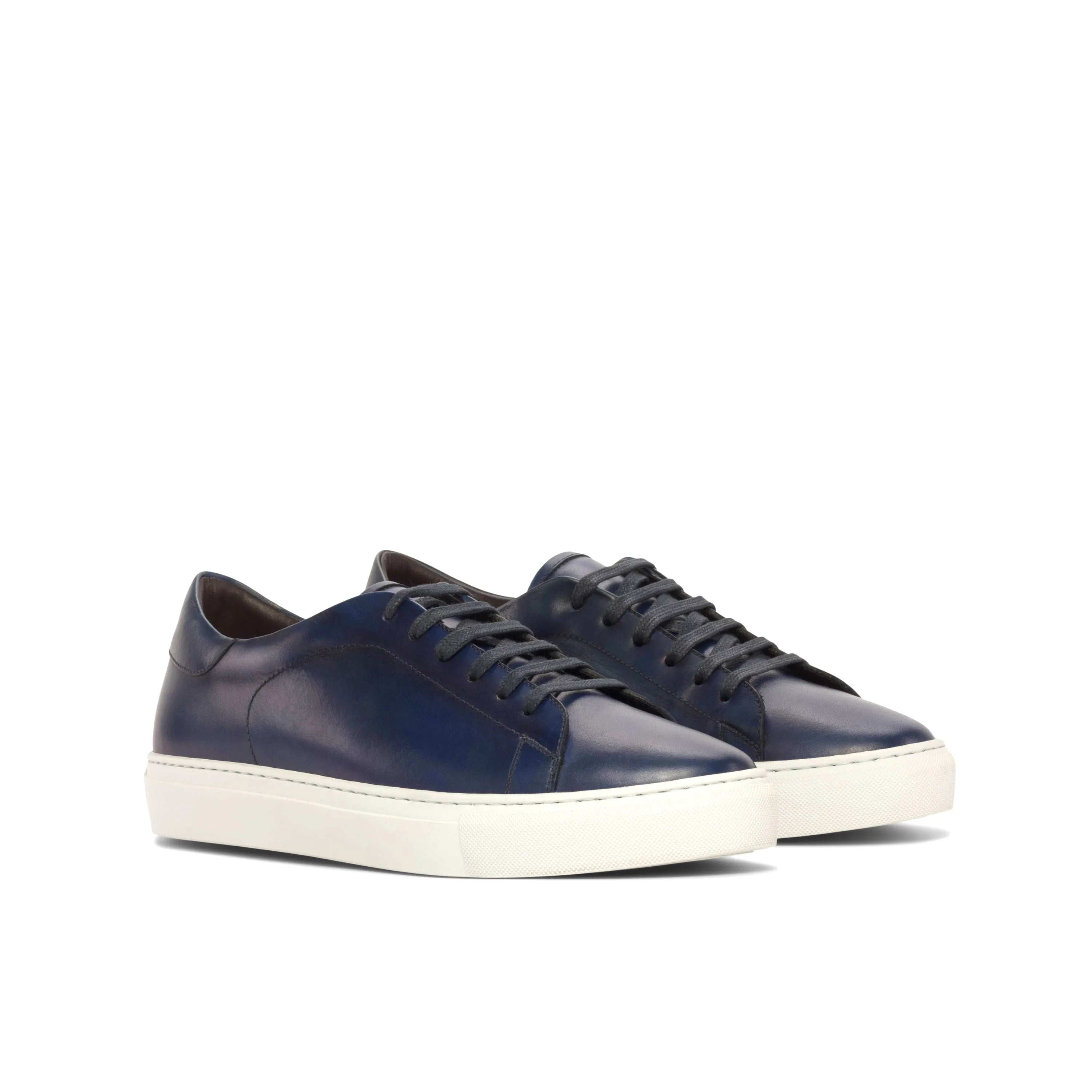 Pair of blue leather sneakers from Jacksons Trainer Sneaker featuring a stylish cupsole trainer design