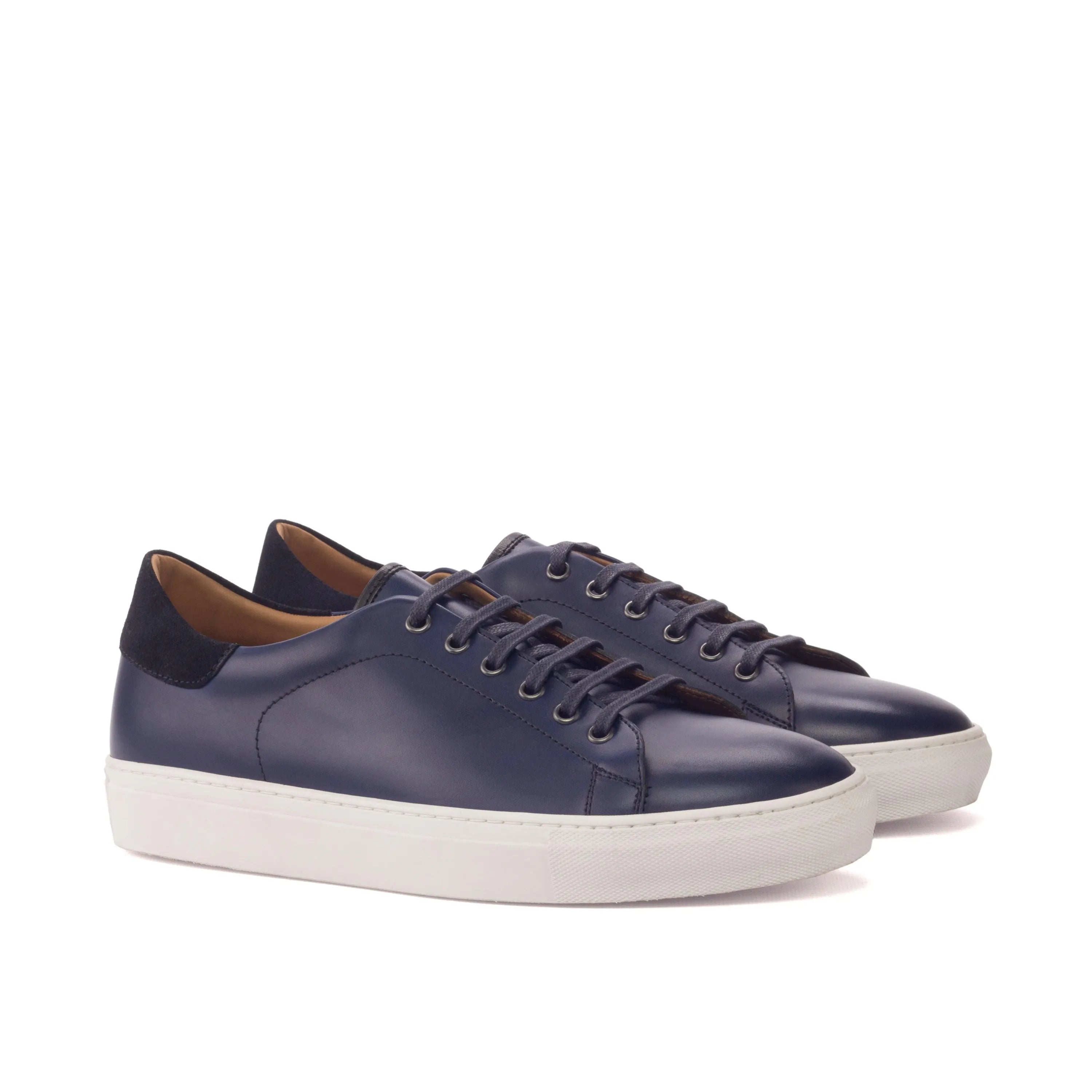 Pair of navy leather Jad Trainer Sneakers showcasing stylish and comfortable design