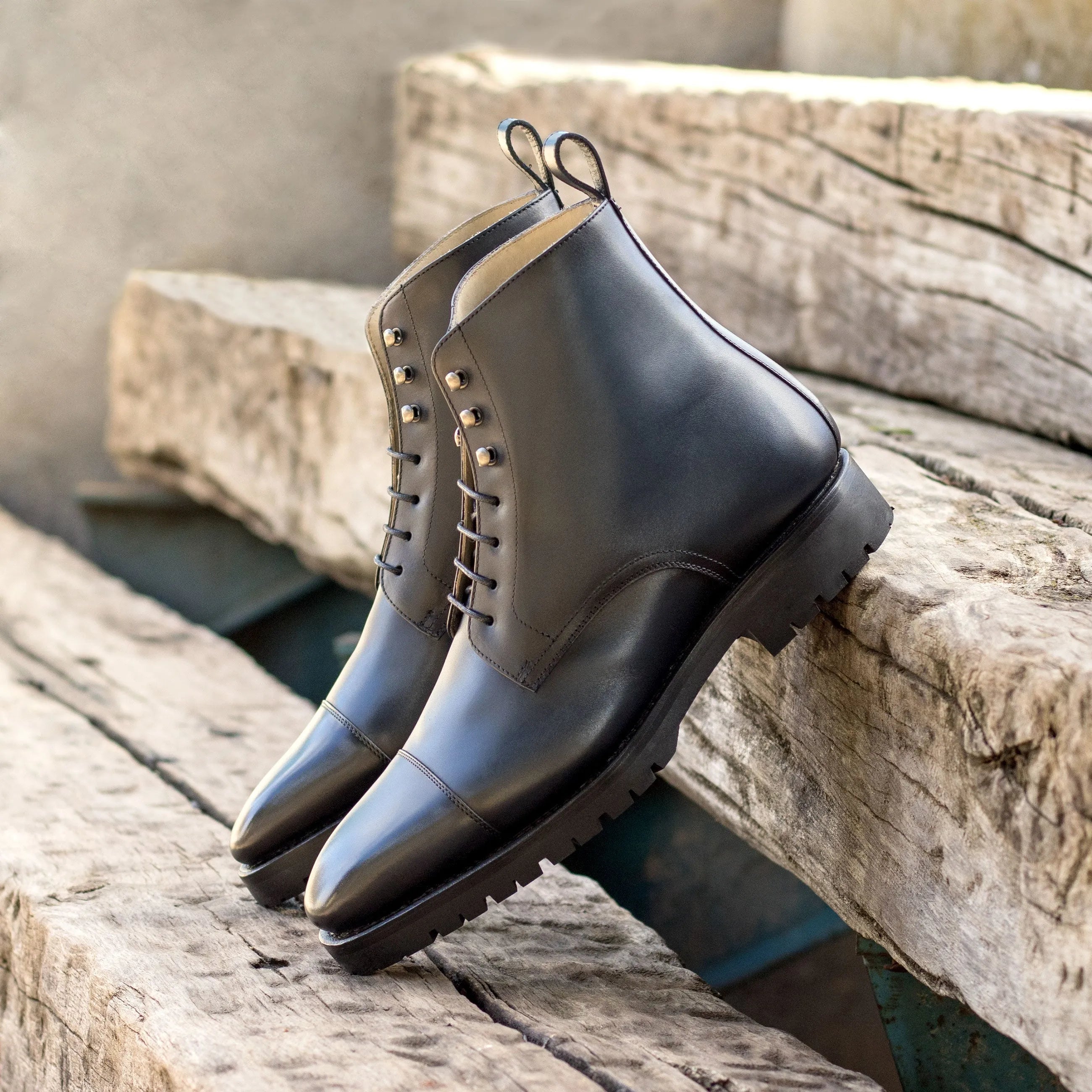 Black leather cap-toe boots from the Jag59 Jumper Boots II collection showcasing elegance