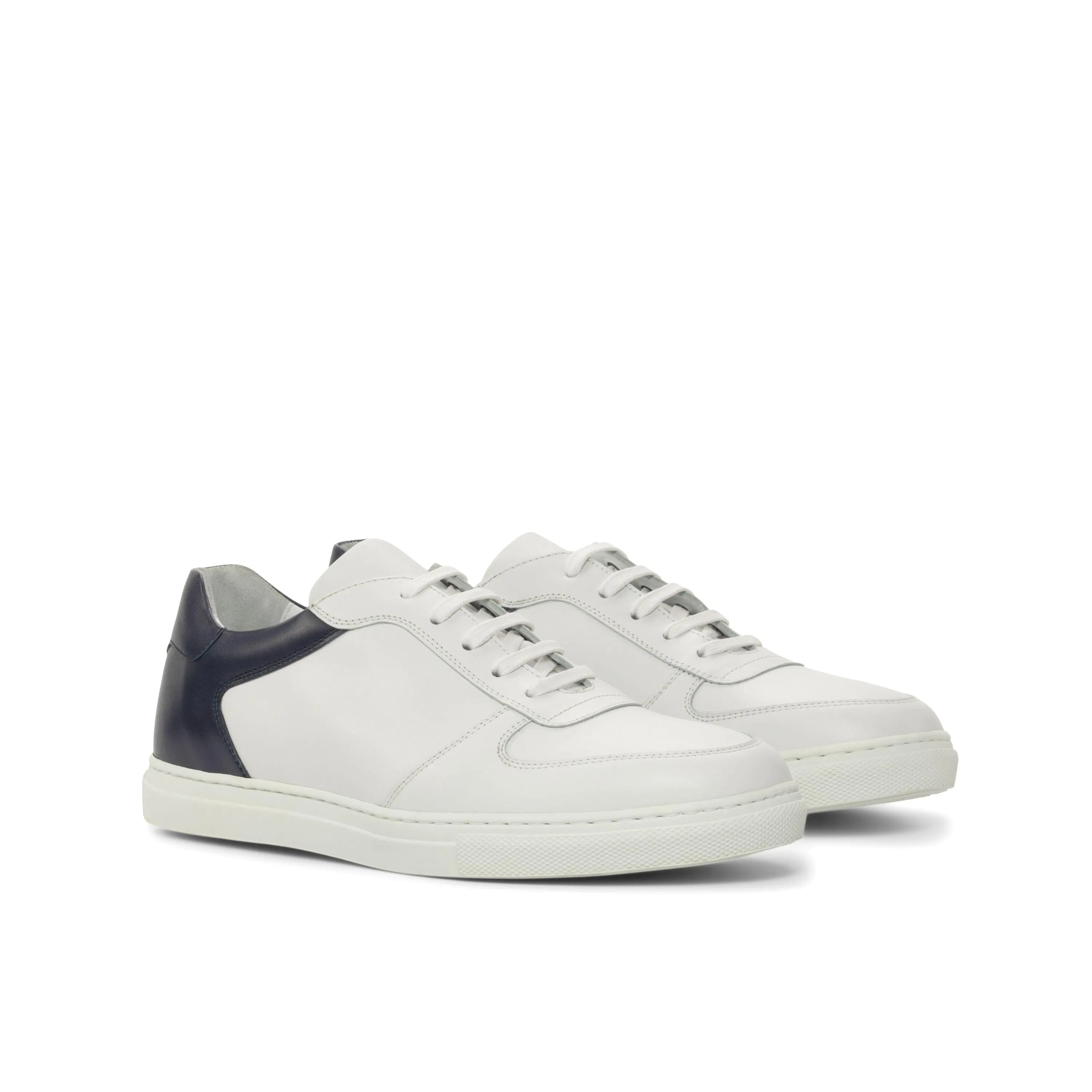 White leather Janko Low Top Sneakers with navy heel, a luxury bespoke trainer sneaker for men