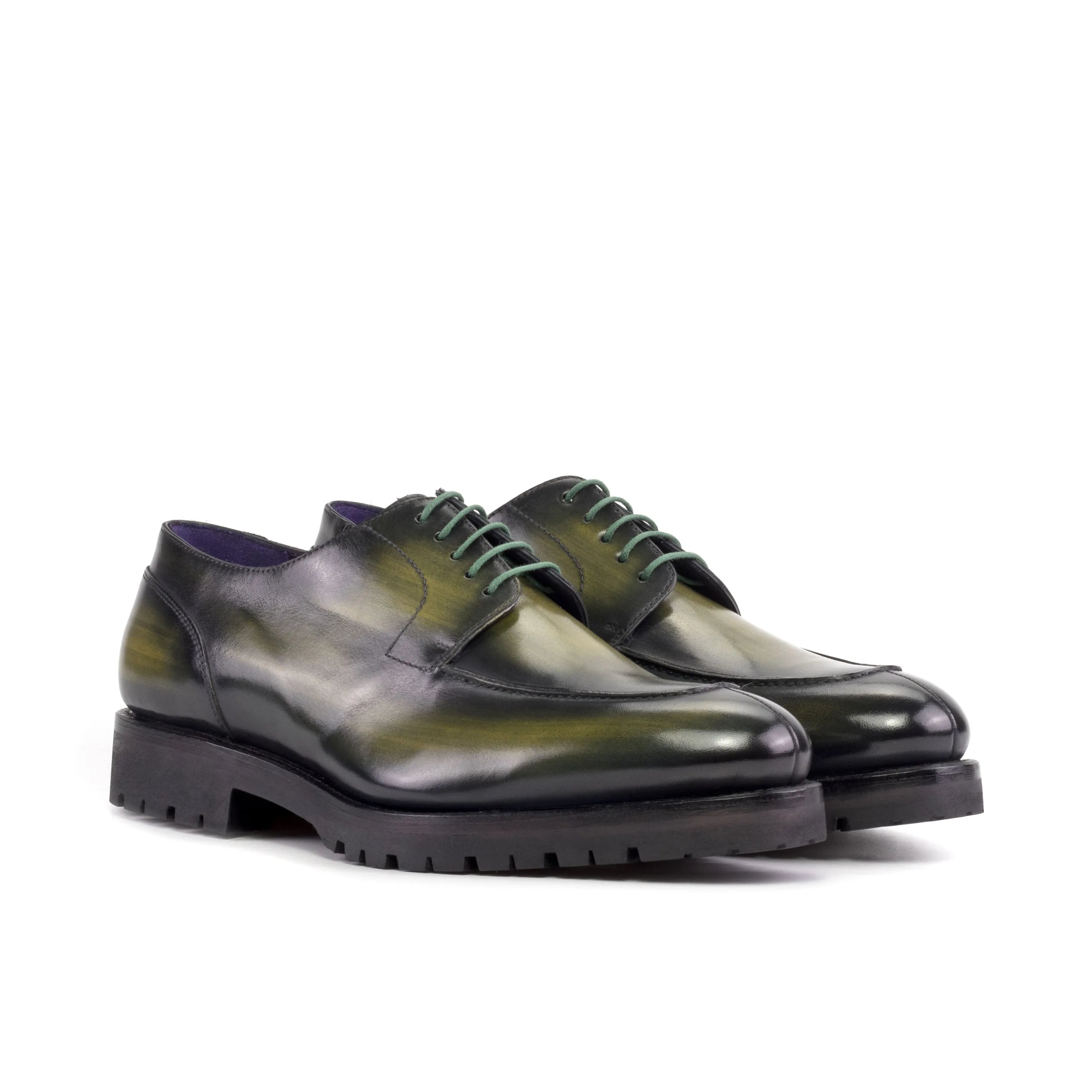 Green leather Jarama Derby Split Toe Patina shoes showcasing elegant craftsmanship