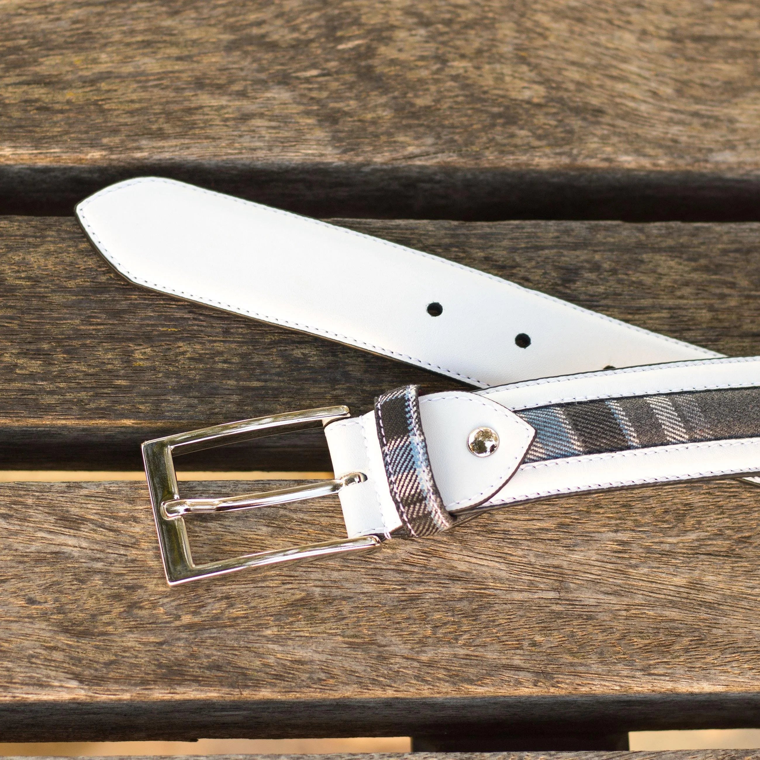Stylish Jazzy Venice Belt featuring a white and plaid design with a silver buckle