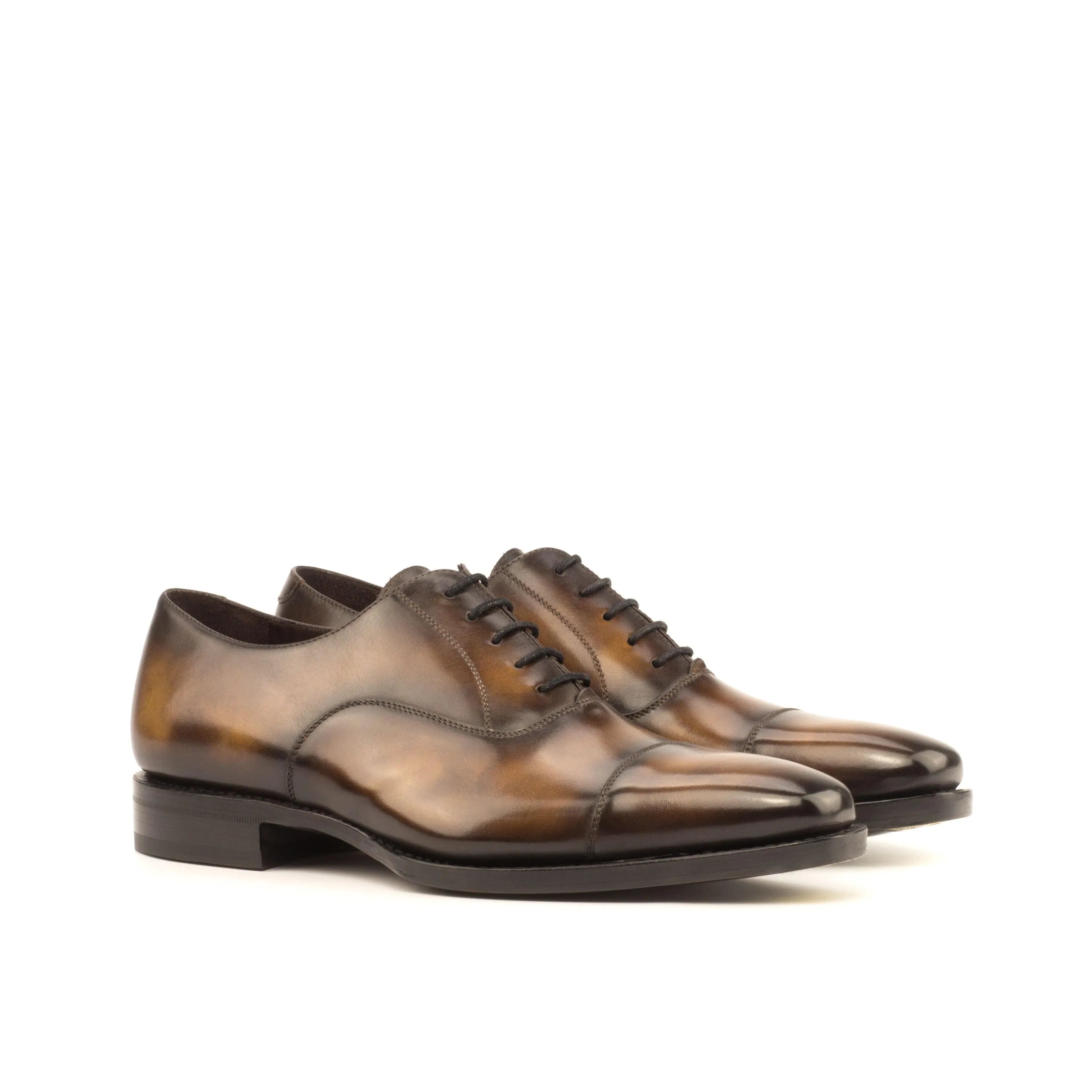 Brown leather Jeriko Oxford Patina shoes displaying elegant craftsmanship and style
